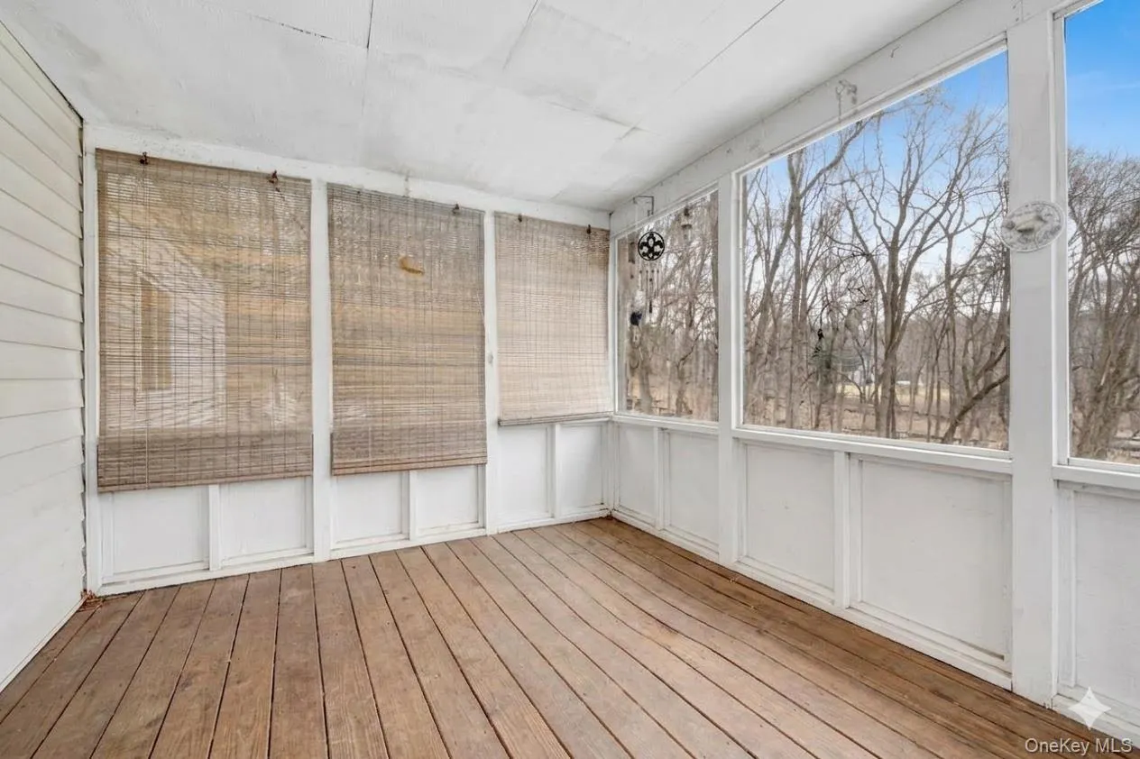 View of unfurnished sunroom View of unfurnished sunroom