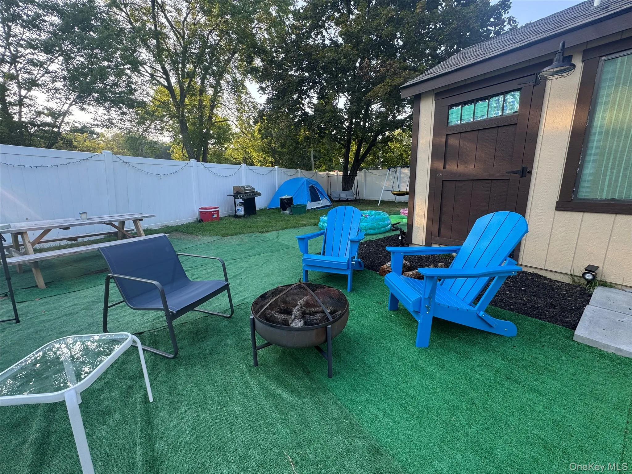 Above ground pool, playground and pool house Above ground pool, playground and pool house