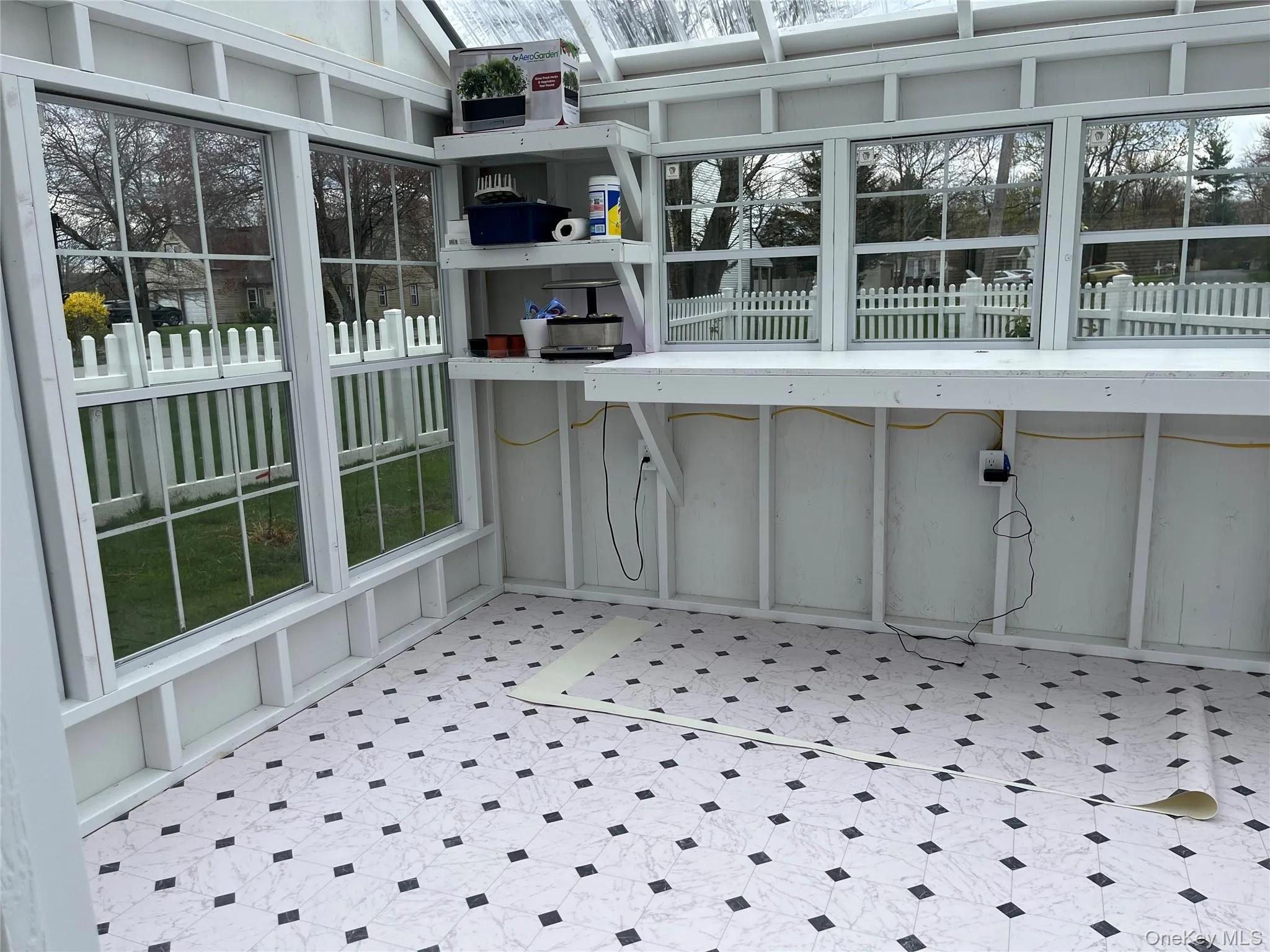 Greenhouse was finished with vinyl flooring to protect wood and equipped with outlets for electric fans and Aerogardens! Greenhouse was finished with vinyl flooring to protect wood and equipped with outlets for electric fans and Aerogardens!