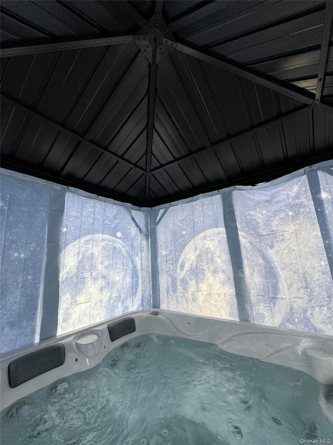 Hot tub that seats 4 with cover and canopy steel pergola for privacy Hot tub that seats 4 with cover and canopy steel pergola for privacy