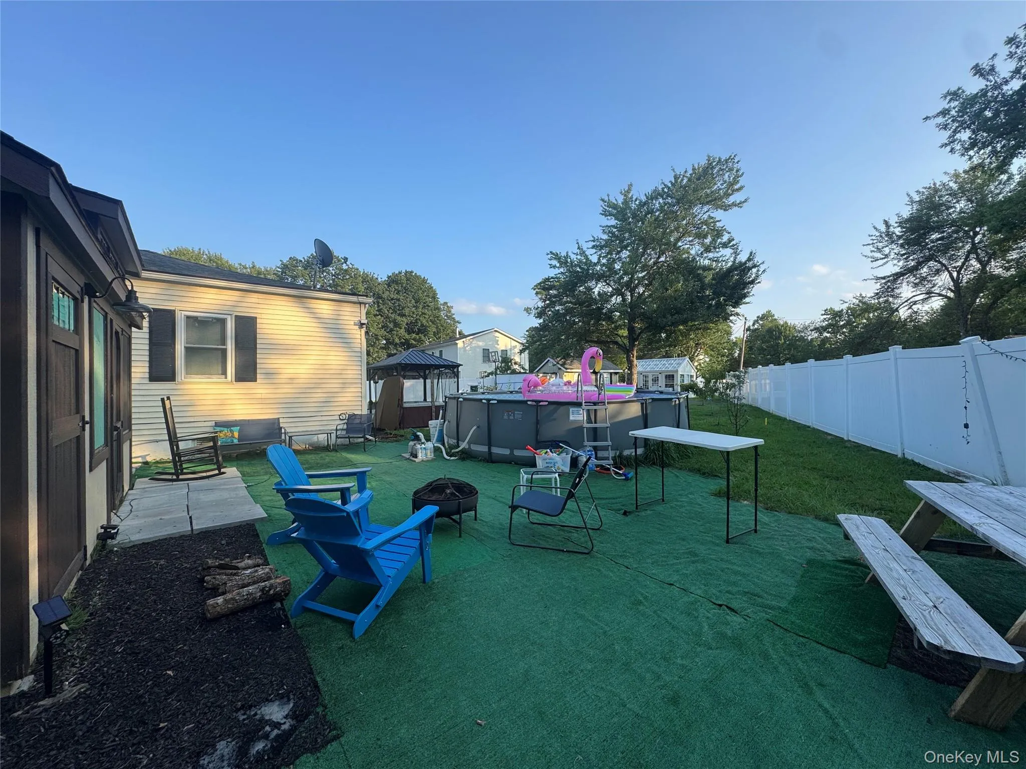Above ground seasonal pool in yard with hot tub and garden of fruit trees and space for more! Above ground seasonal pool in yard with hot tub and garden of fruit trees and space for more!