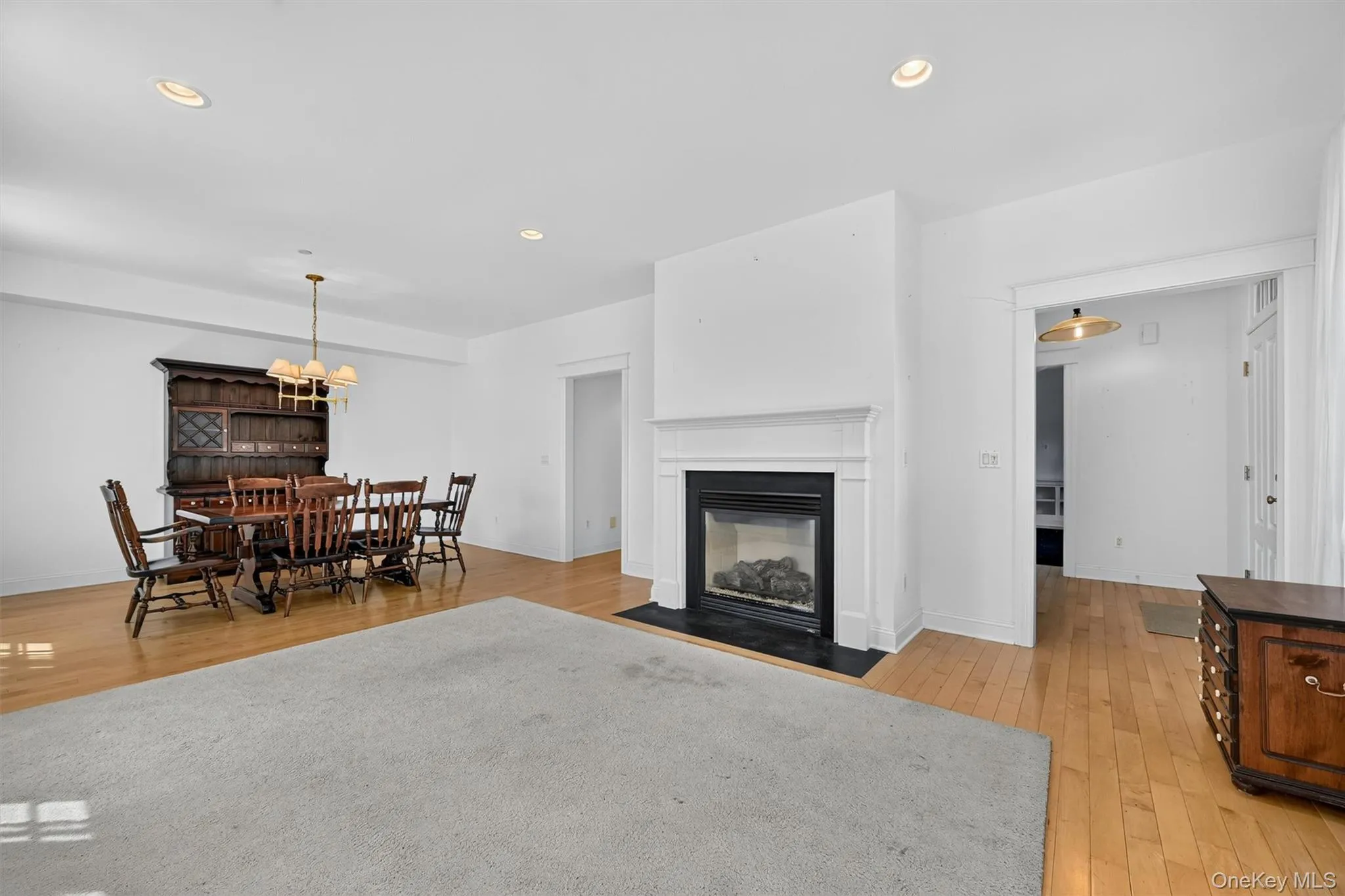 The gas fireplace anchors the open living and dining space, adding warmth and charm to the main level. The gas fireplace anchors the open living and dining space, adding warmth and charm to the main level.