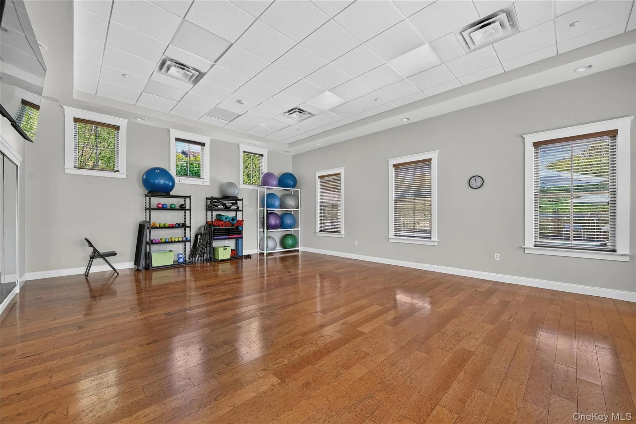 A bright exercise and activity space provides room for movement, classes, and wellness routines. A bright exercise and activity space provides room for movement, classes, and wellness routines.