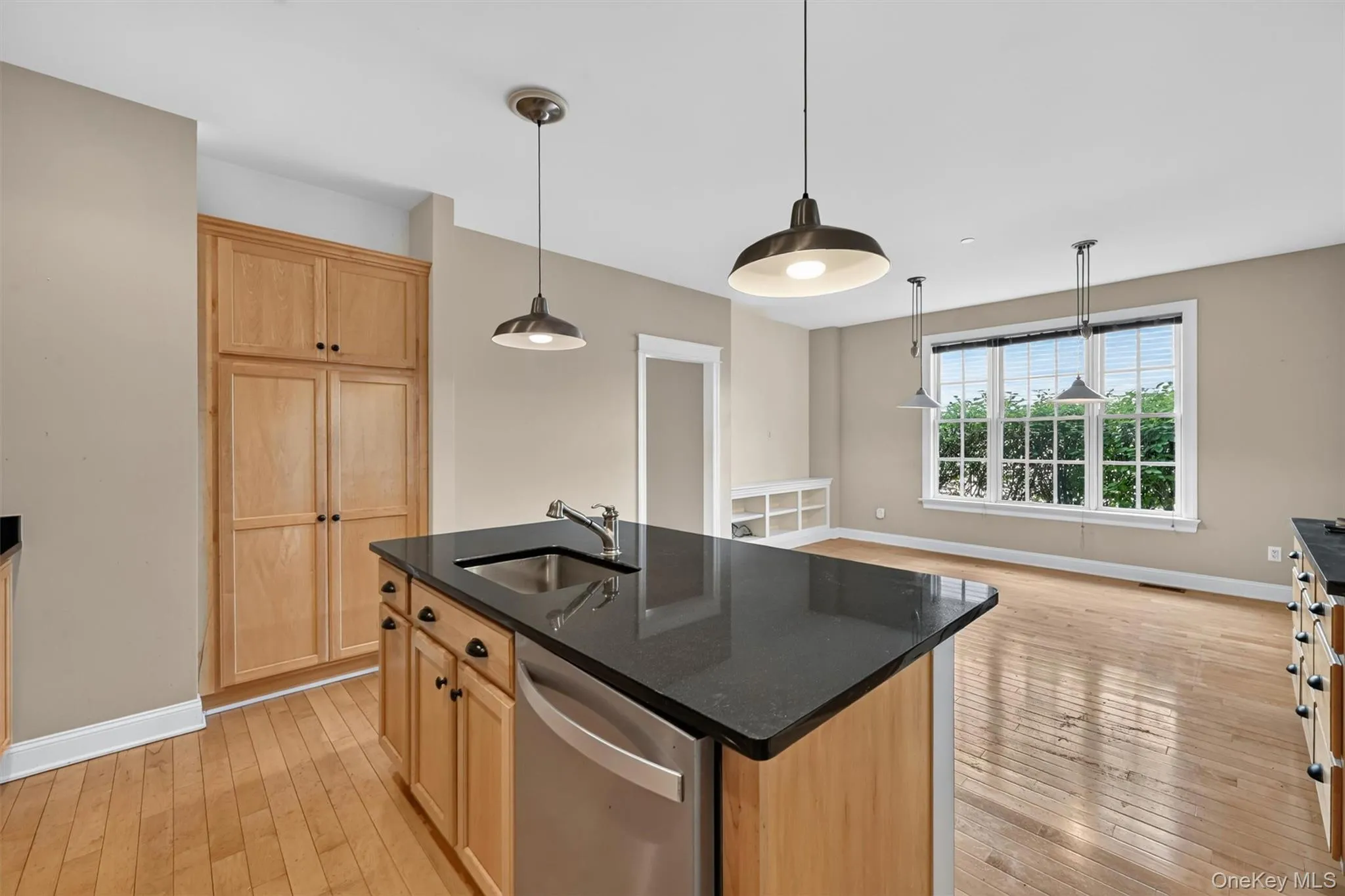 The large kitchen island provides extra prep space, storage, and an easy place to gather while meals are being made. The large kitchen island provides extra prep space, storage, and an easy place to gather while meals are being made.