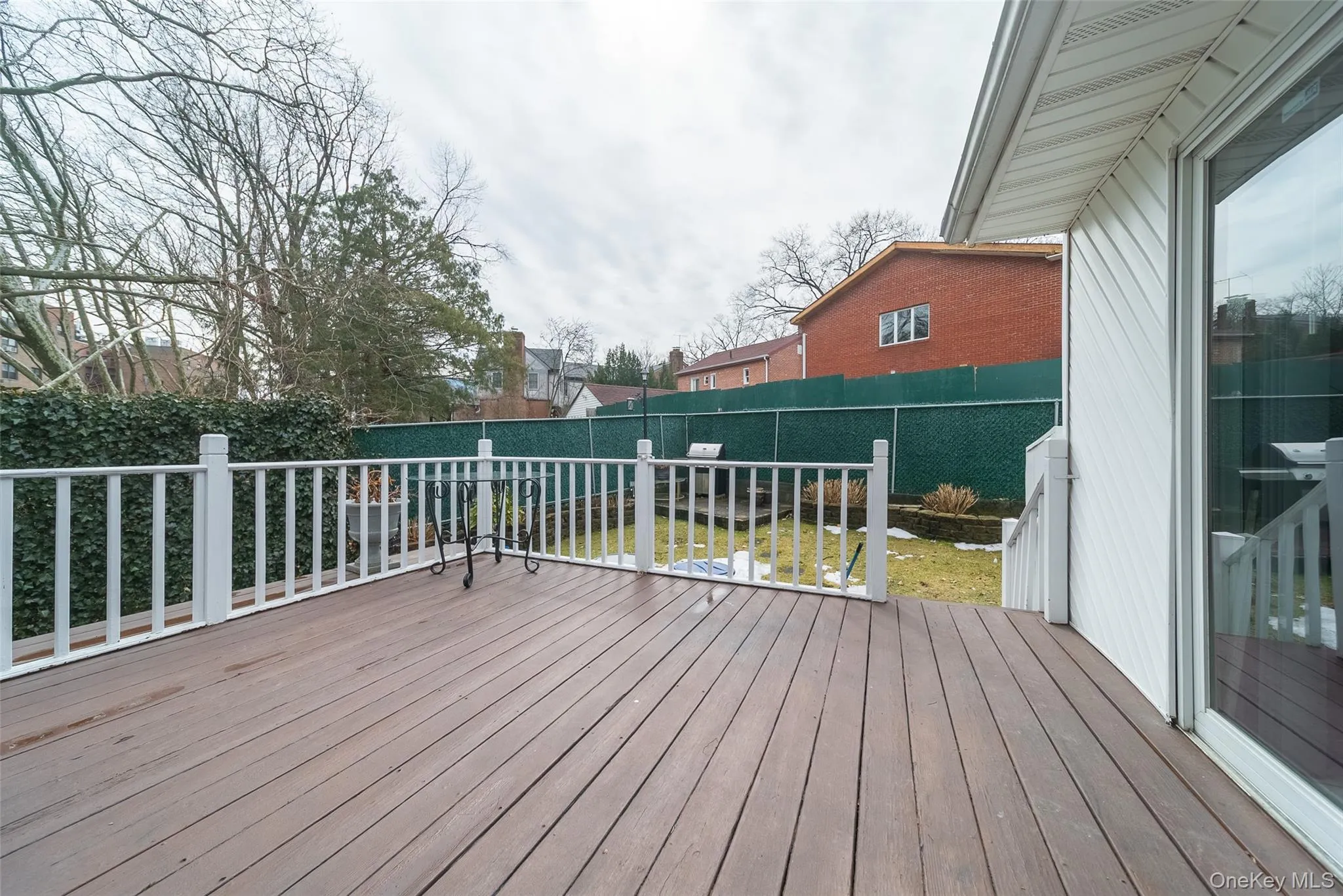 Deck with a fenced backyard Deck with a fenced backyard