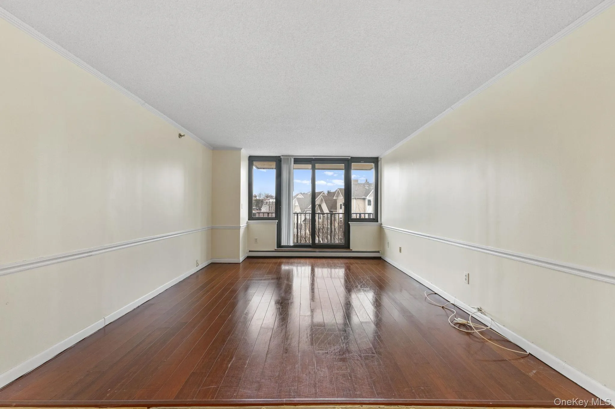 Private balcony off of living room space. Private balcony off of living room space.