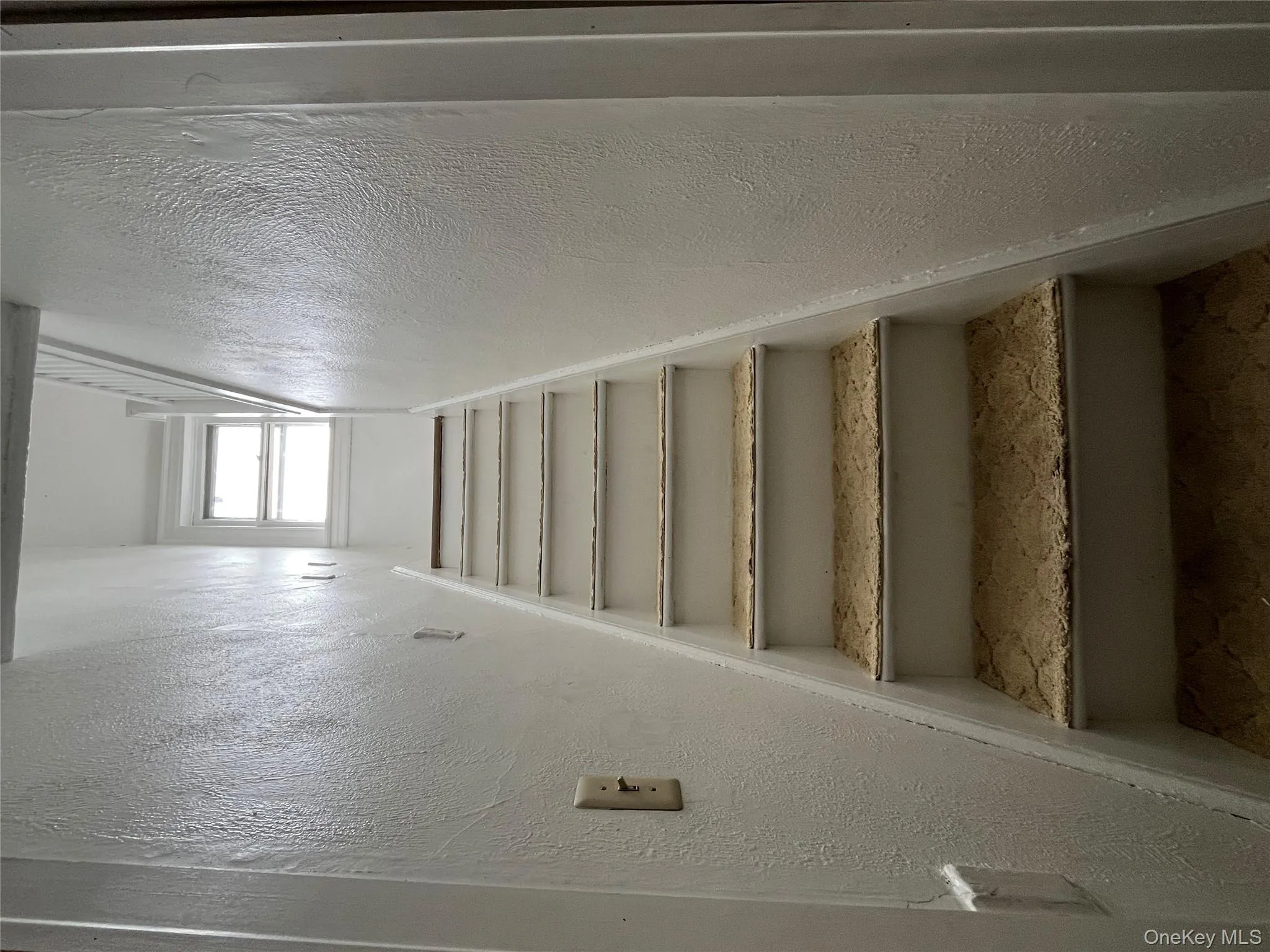 Entry stairs from the door up to the penthouse unit. Entry stairs from the door up to the penthouse unit.