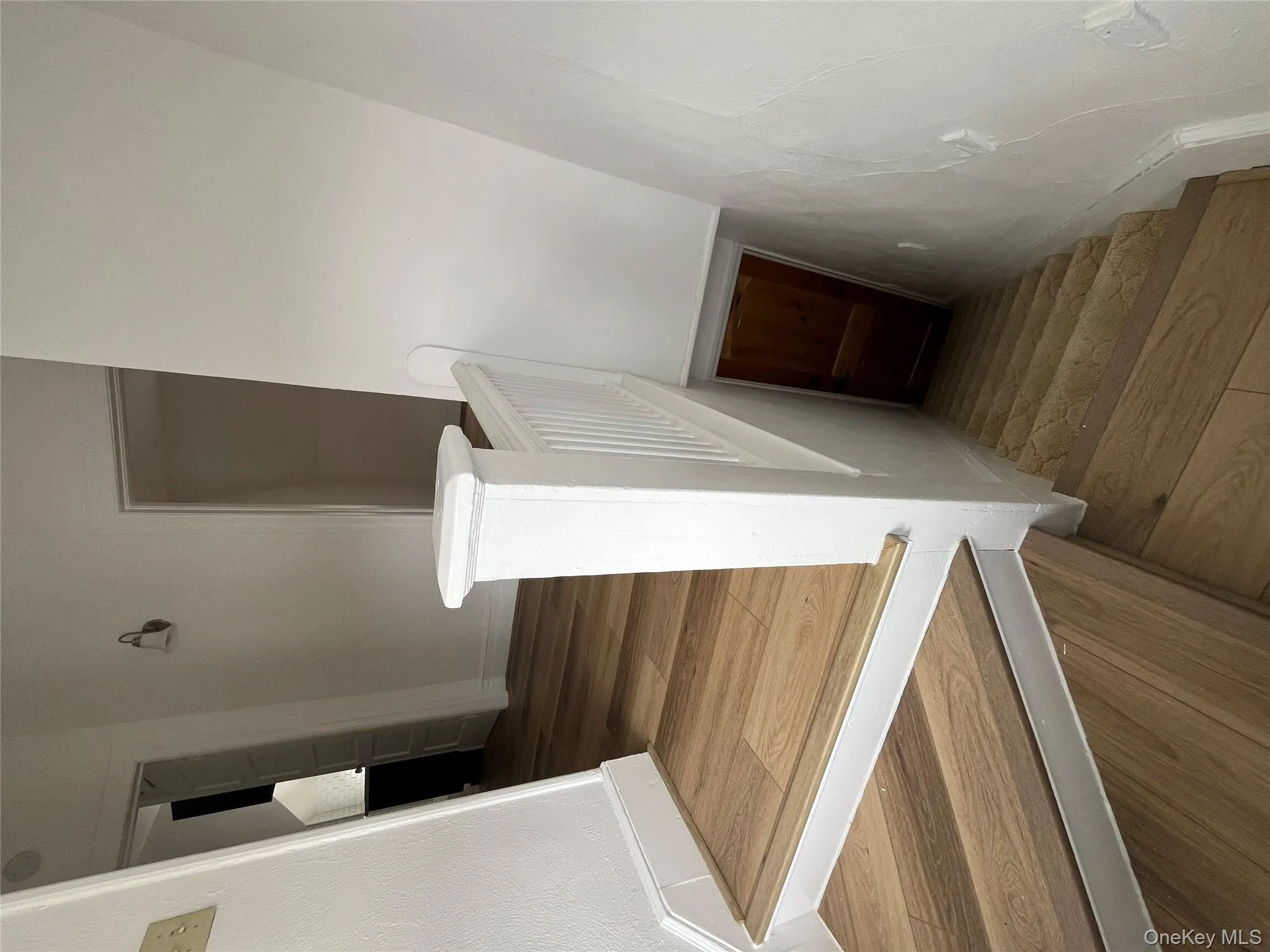 Stairs to the entry foyer area. Stairs to the entry foyer area.