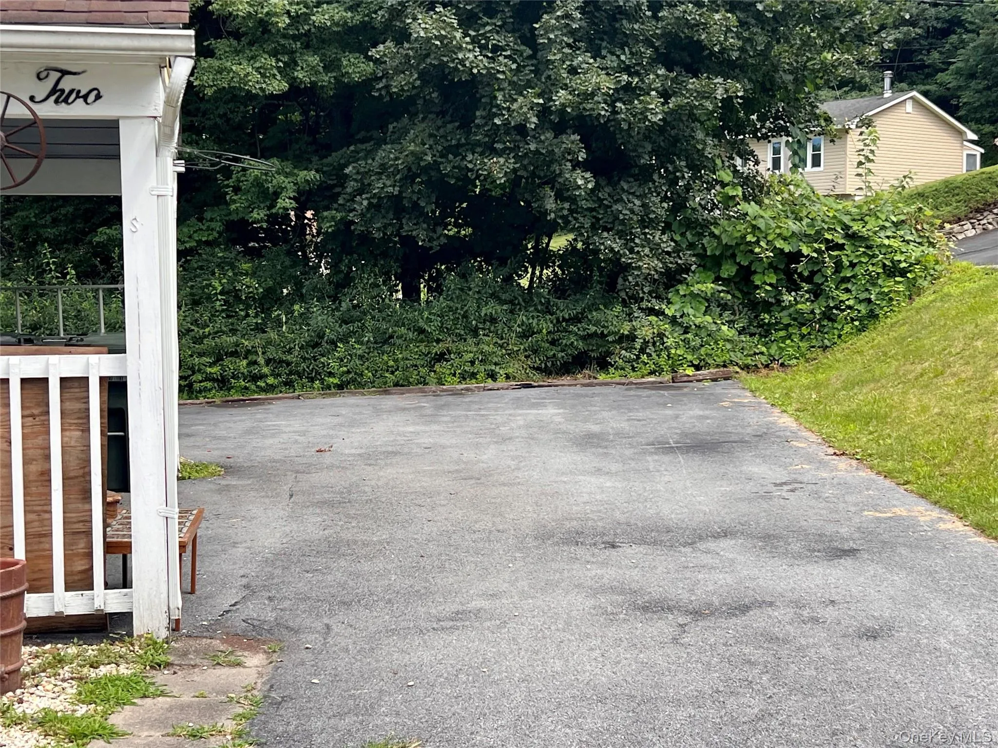 Driveway - 2 spaces for tenant Driveway - 2 spaces for tenant