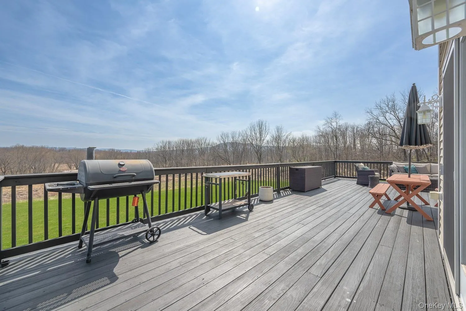 Elevated deck with sweeping views of the surrounding countryside—perfect for relaxing or hosting gatherings. Elevated deck with sweeping views of the surrounding countryside—perfect for relaxing or hosting gatherings.