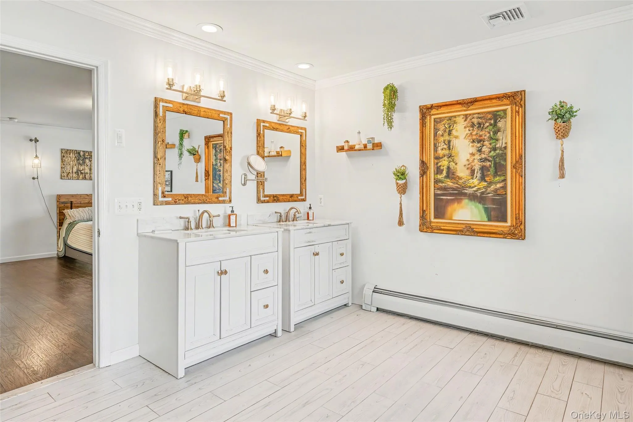 Dual vanity with generous storage and updated finishes, designed for both style and functionality. Dual vanity with generous storage and updated finishes, designed for both style and functionality.
