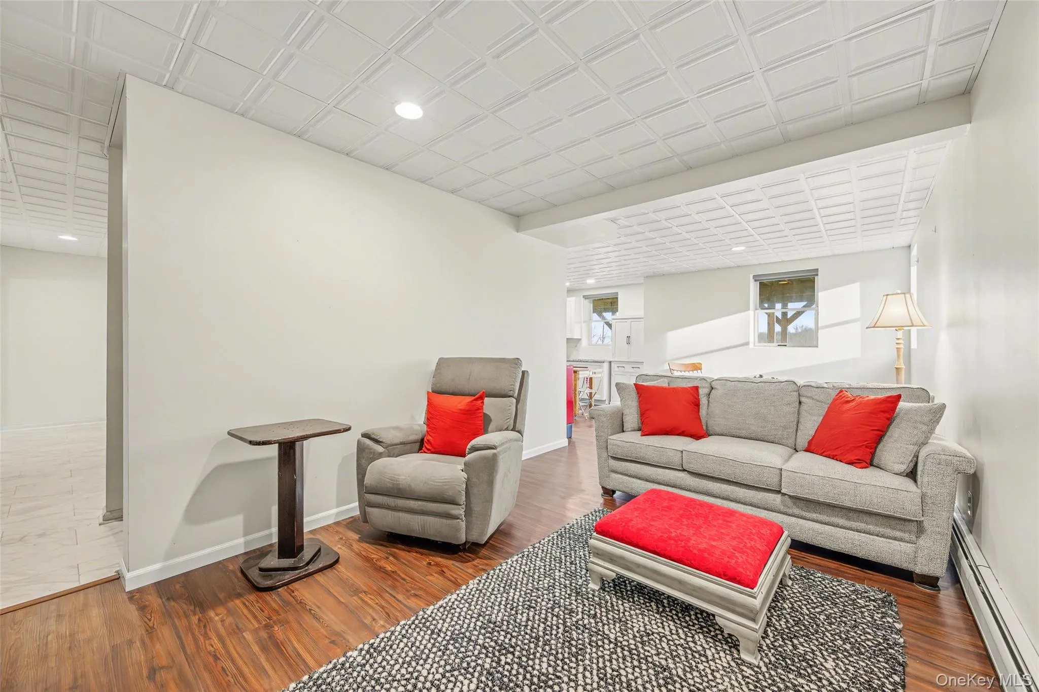 Finished lower level provides additional living space, perfect for a media room, lounge, or recreational use. Finished lower level provides additional living space, perfect for a media room, lounge, or recreational use.
