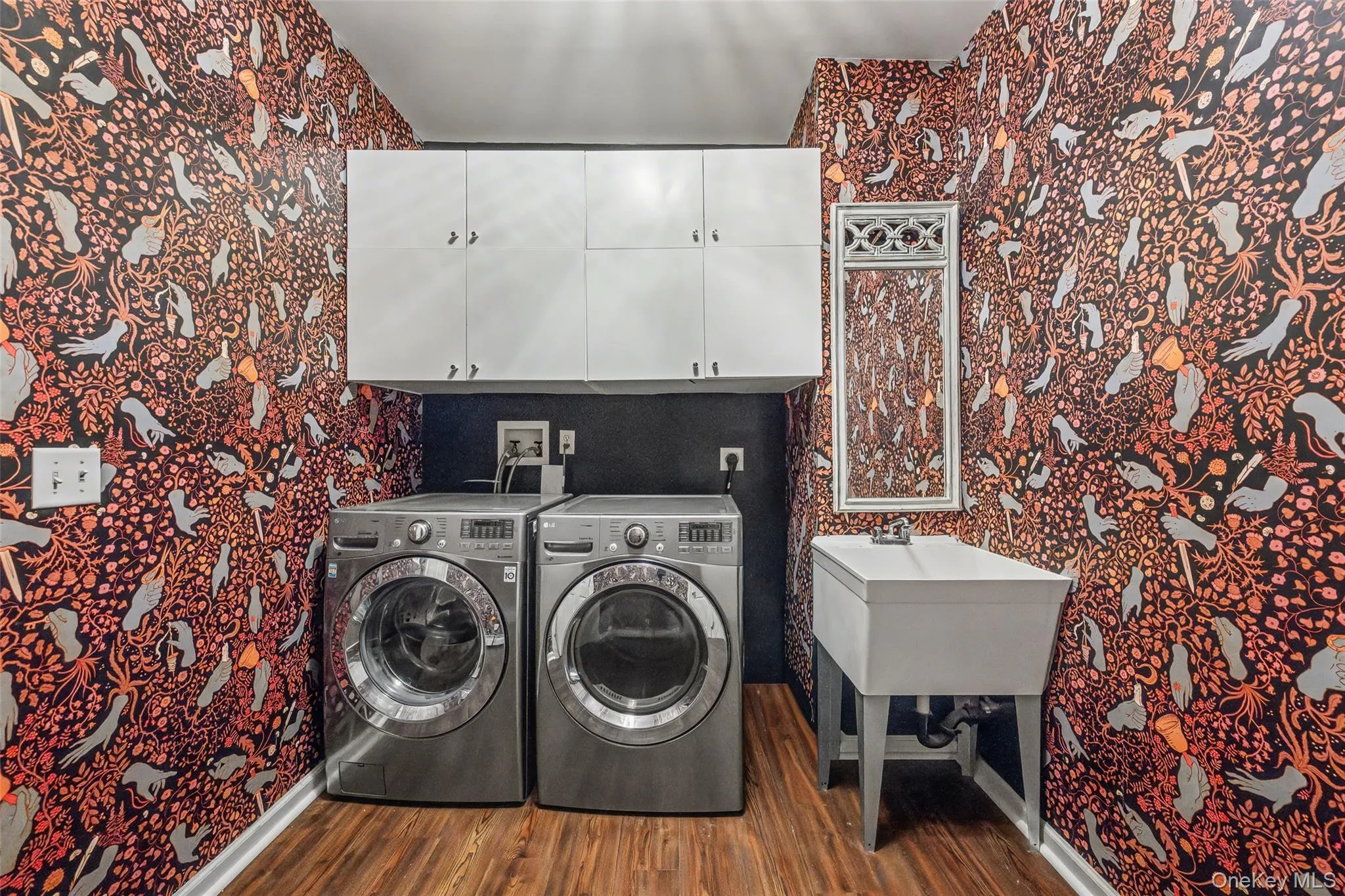 Dedicated laundry room with built-in storage and workspace, thoughtfully designed for everyday convenience. Located between the garage and the kitchen allows the space to double as a mud area. Dedicated laundry room with built-in storage and workspace, thoughtfully designed for everyday convenience. Located between the garage and the kitchen allows the space to double as a mud area.