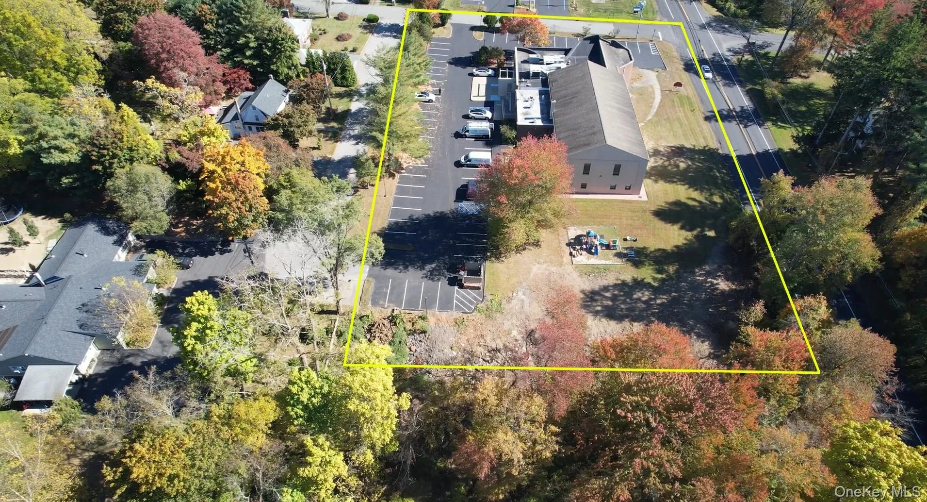 Aerial view of property's location with property boundaries highlighted Aerial view of property's location with property boundaries highlighted