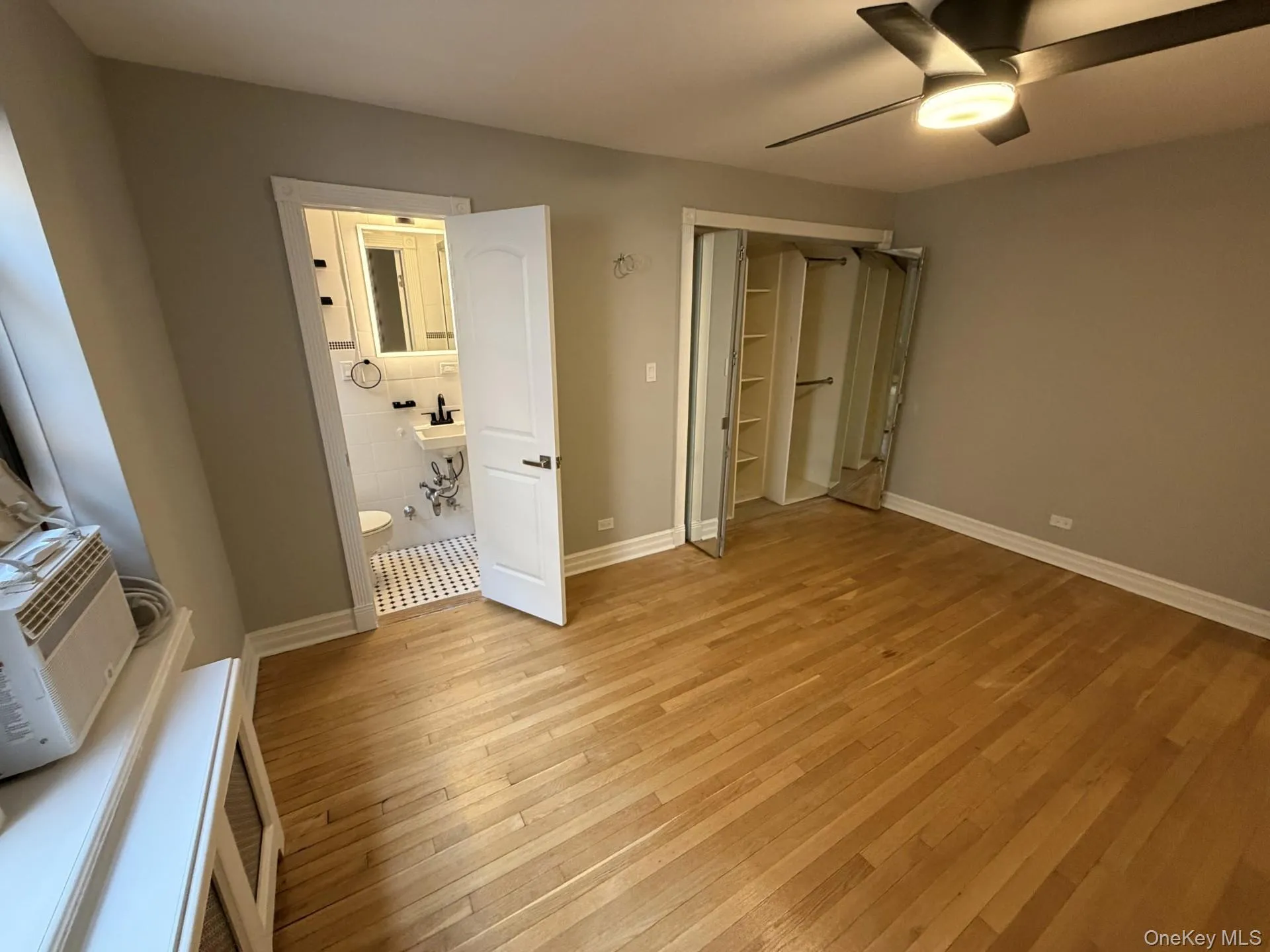 Windowed Primary bedroom with ensuite bathroom and California closet Windowed Primary bedroom with ensuite bathroom and California closet