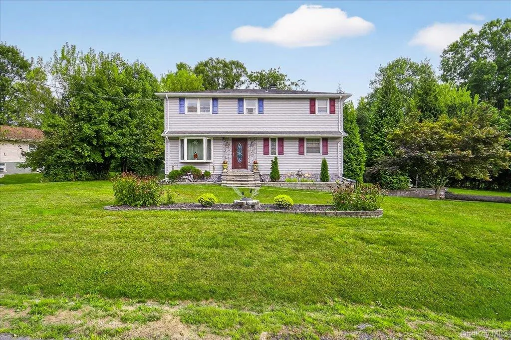 View of front of house with a front lawn View of front of house with a front lawn