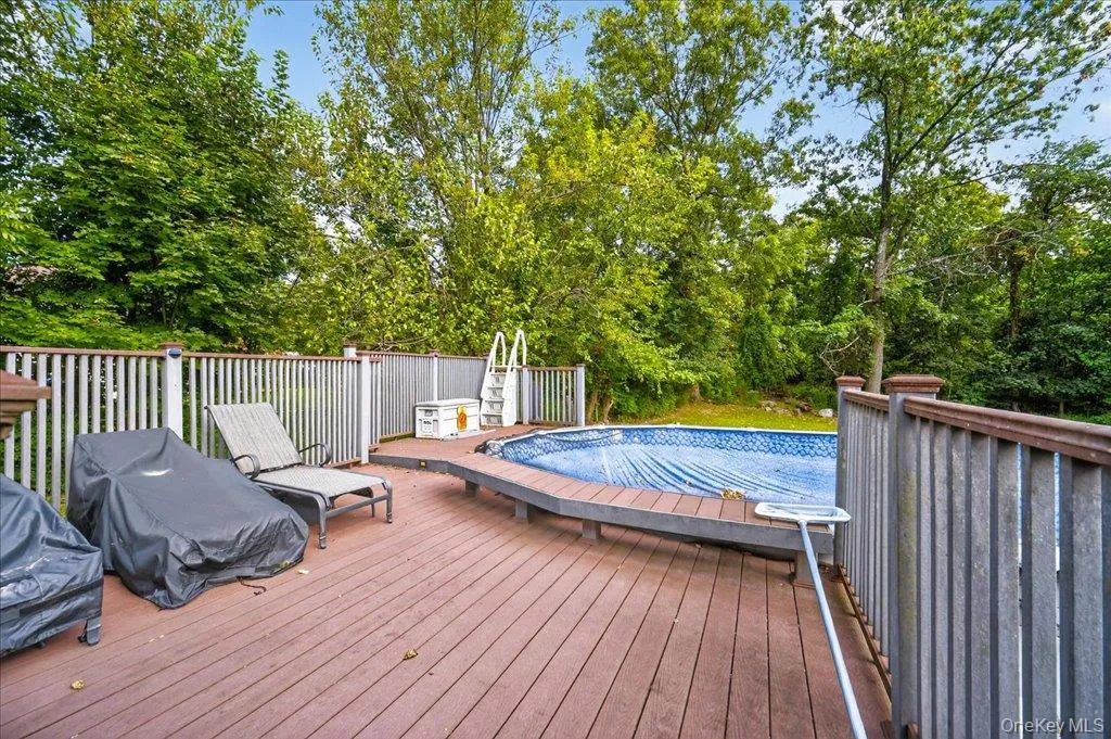 View of swimming pool with a deck View of swimming pool with a deck