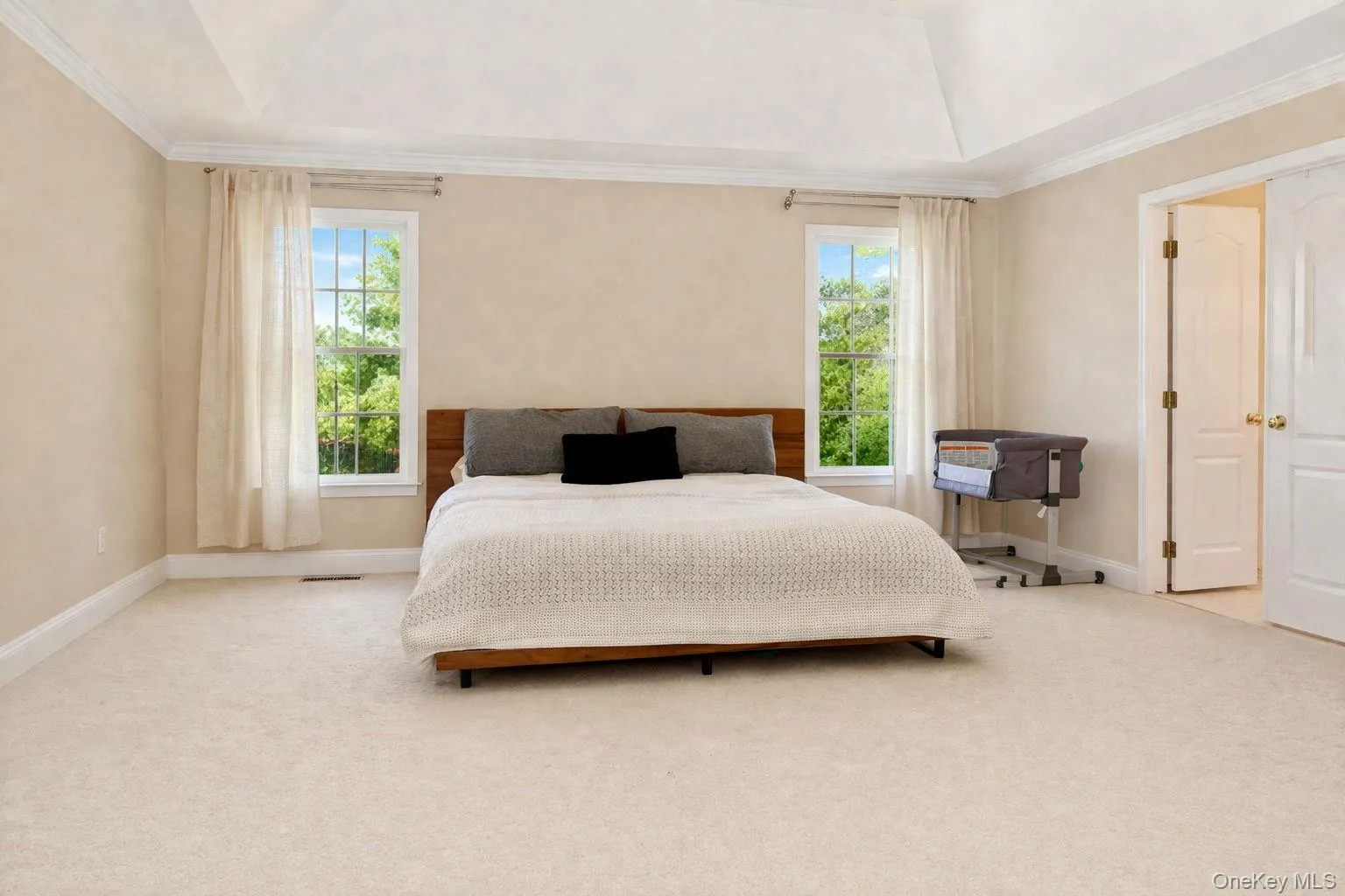Expansive primary bedroom with an additional room, tremendous walk-in closet, soaking tub bathroom with treeline views. Expansive primary bedroom with an additional room, tremendous walk-in closet, soaking tub bathroom with treeline views.