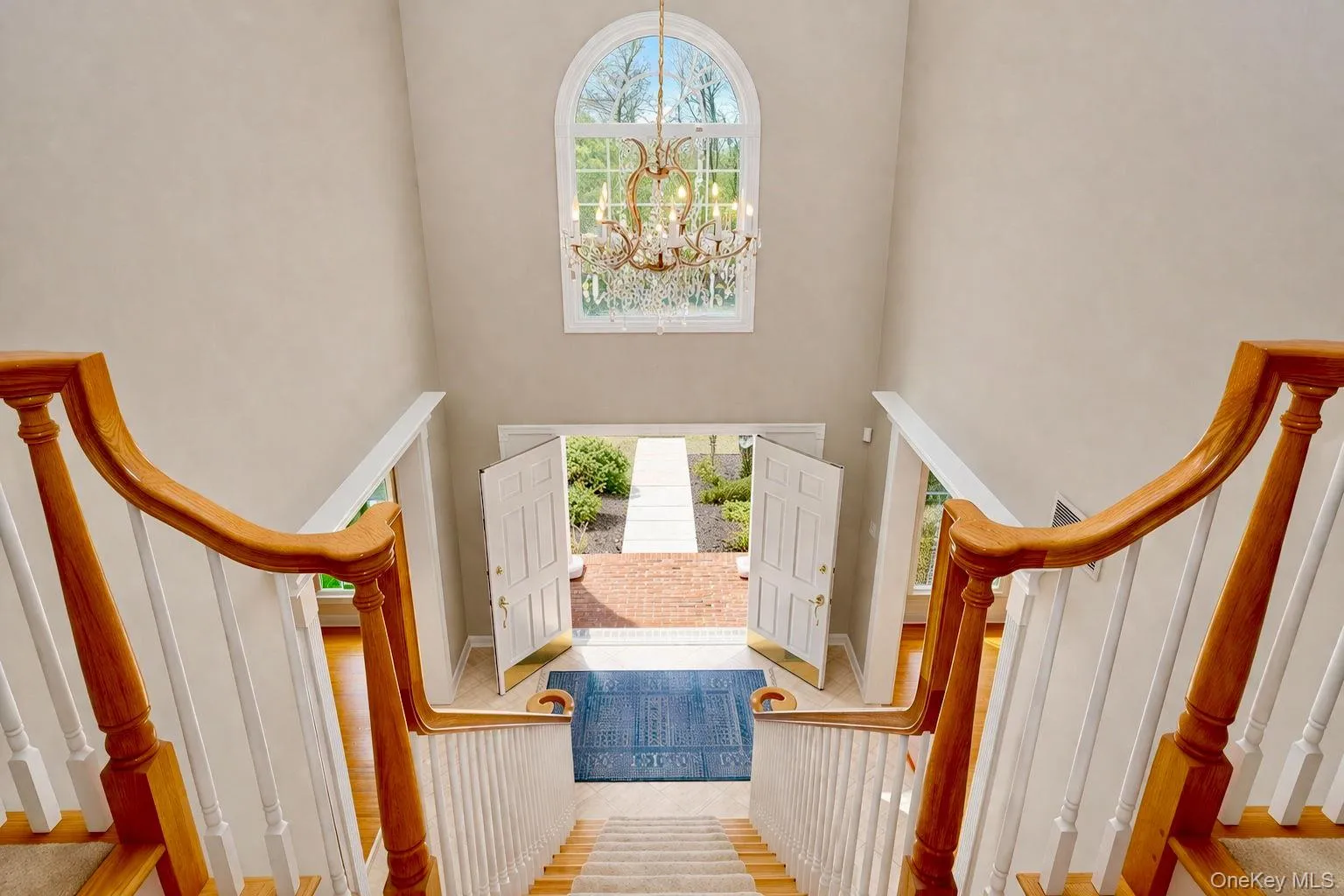 View of front door from 2nd floor to entryway foyer. View of front door from 2nd floor to entryway foyer.