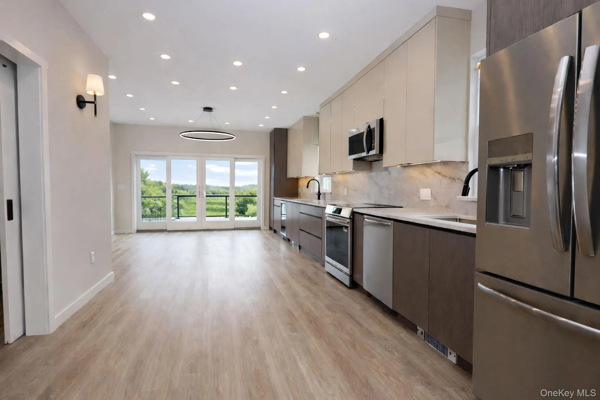 Open concept eat in kitchen and living room Open concept eat in kitchen and living room
