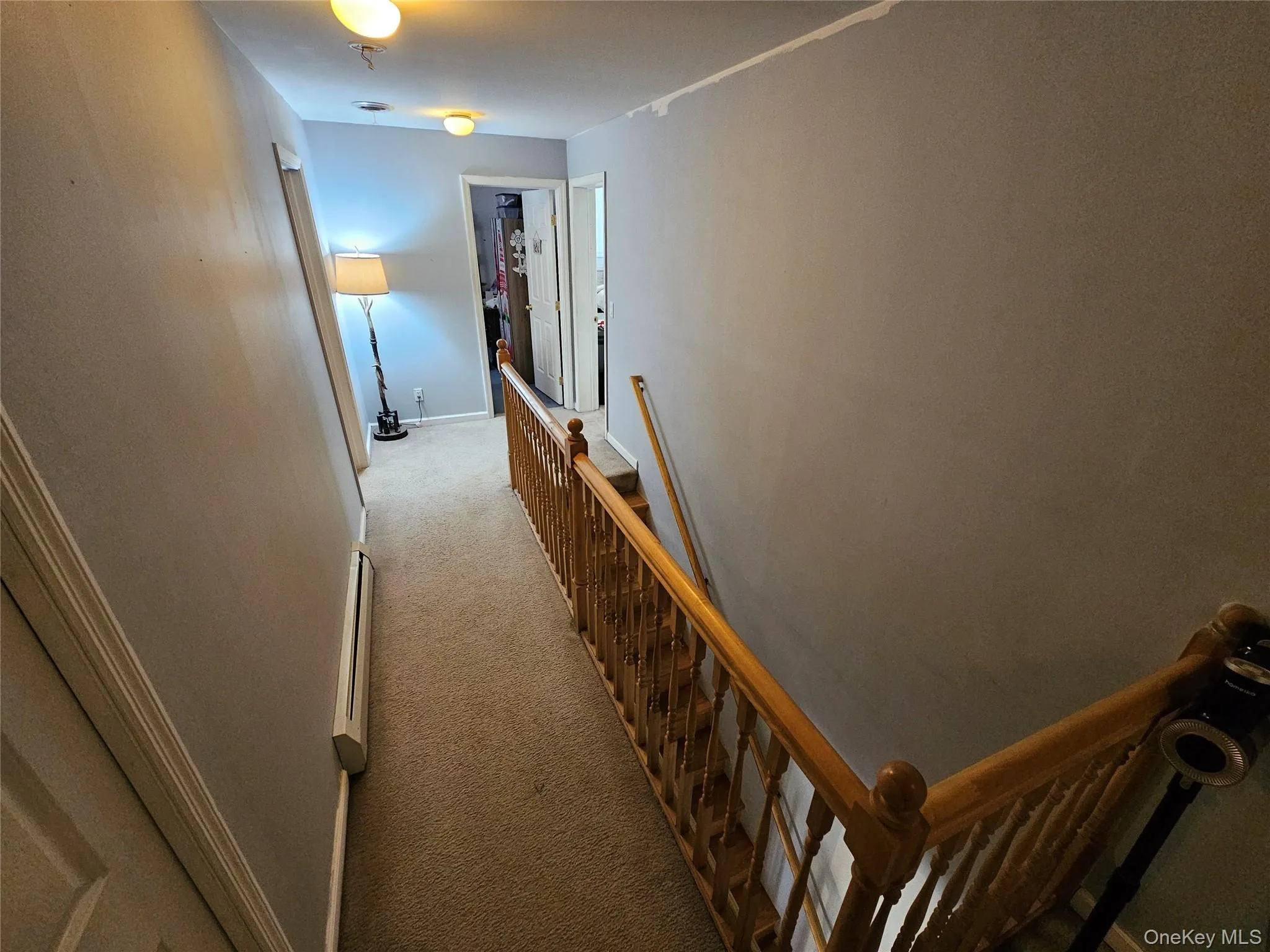 2nd Floor featuring light colored carpet and an upstairs landing 2nd Floor featuring light colored carpet and an upstairs landing
