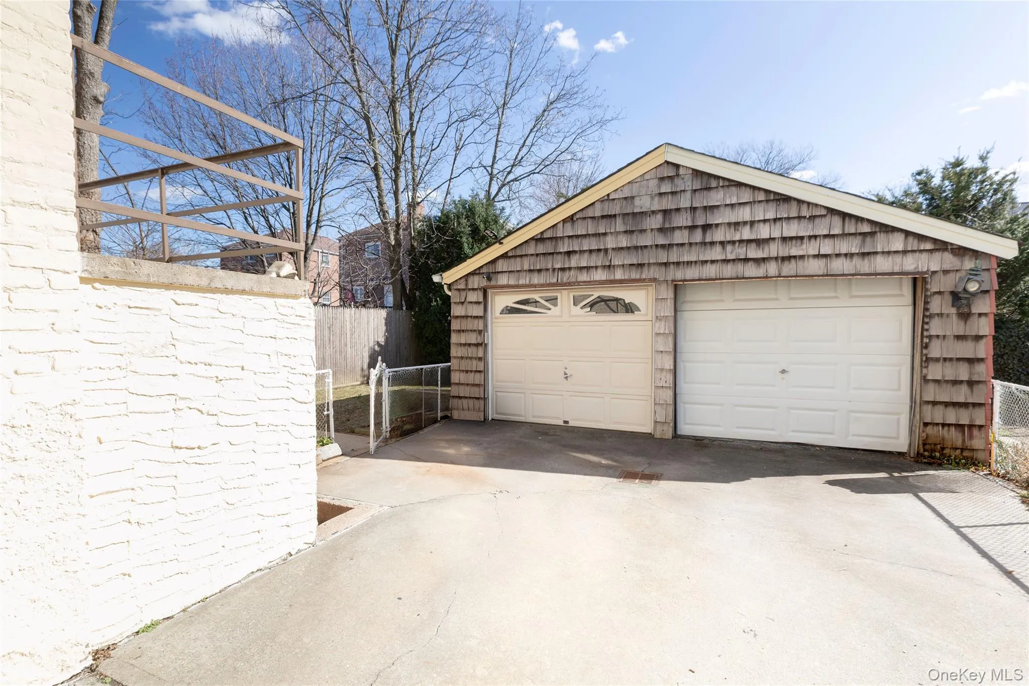 One car garage off shared driveway One car garage off shared driveway