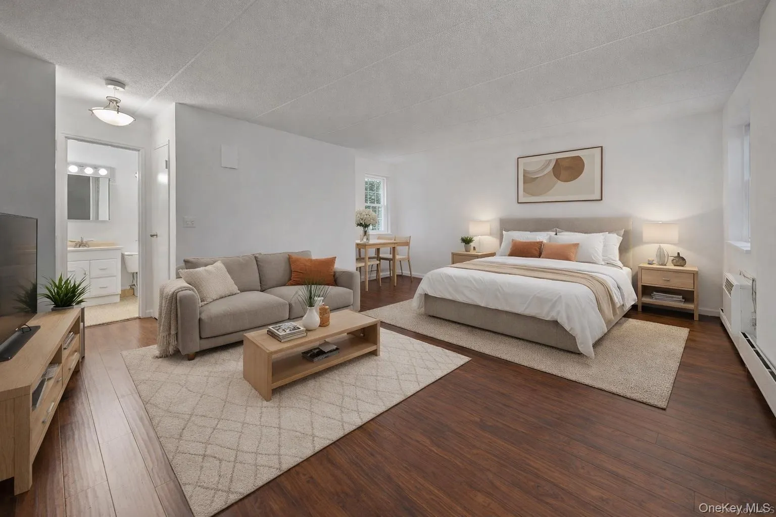 Bedroom featuring hardwood / wood-style flooring Bedroom featuring hardwood / wood-style flooring