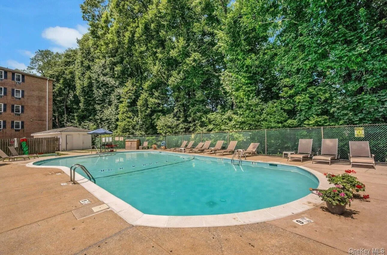 Community pool featuring a patio Community pool featuring a patio