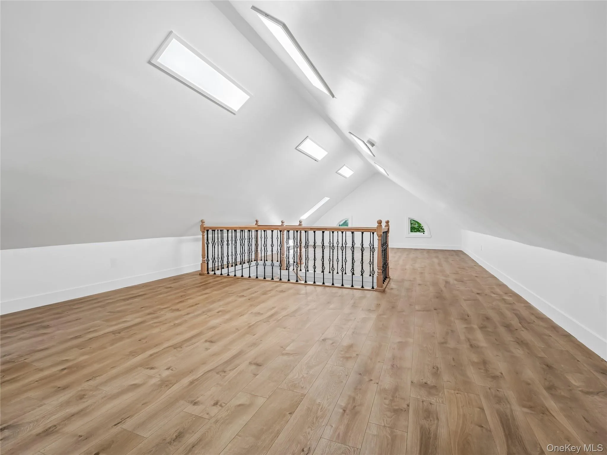 Well apportioned finished attic with brand-new skylight, brand-new flooring, lighting and insulation. Well apportioned finished attic with brand-new skylight, brand-new flooring, lighting and insulation.