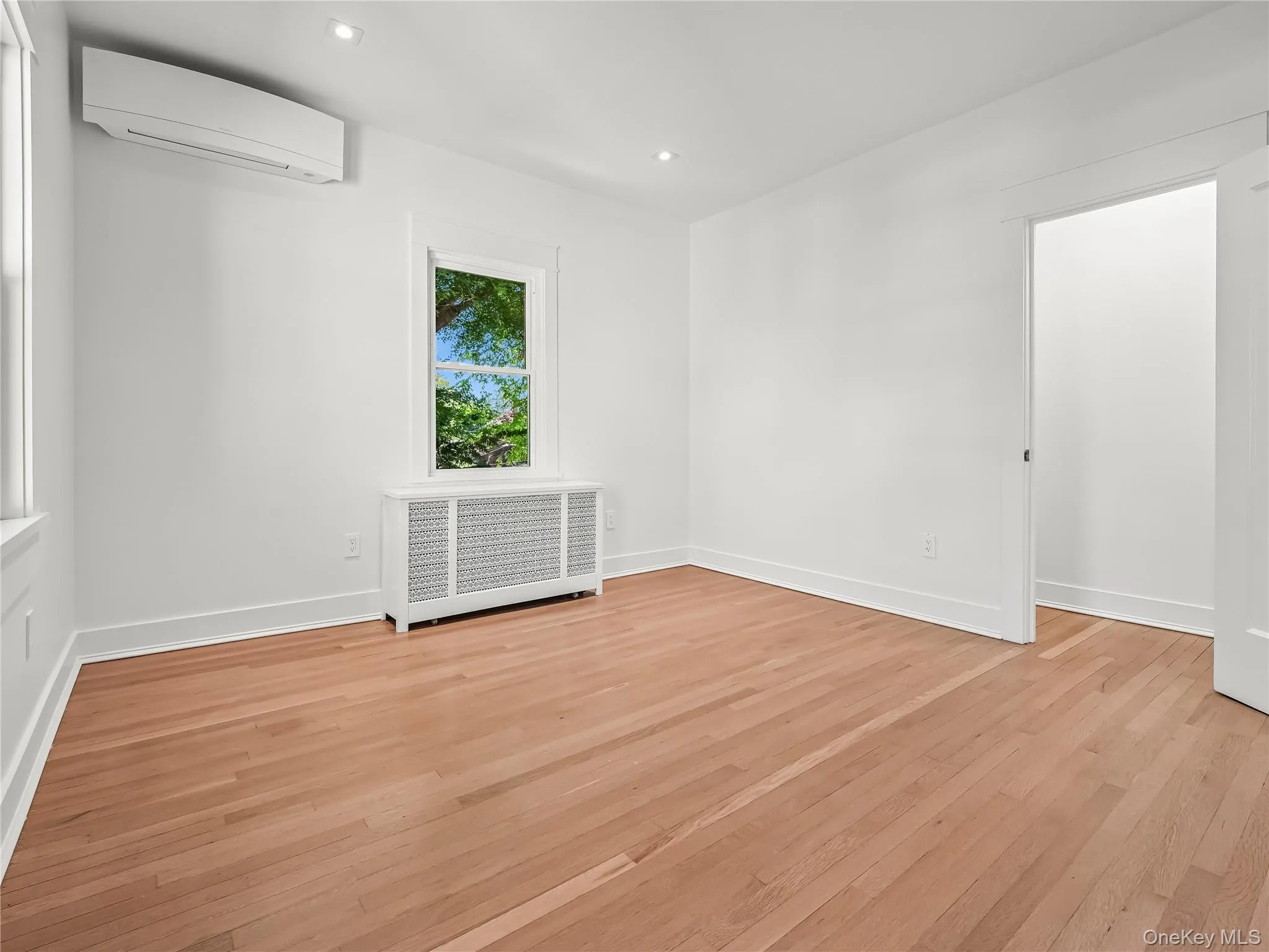 Large bedroom with closet, brand-new windows and split unit; all new lighting, electric, and insulation. Large bedroom with closet, brand-new windows and split unit; all new lighting, electric, and insulation.