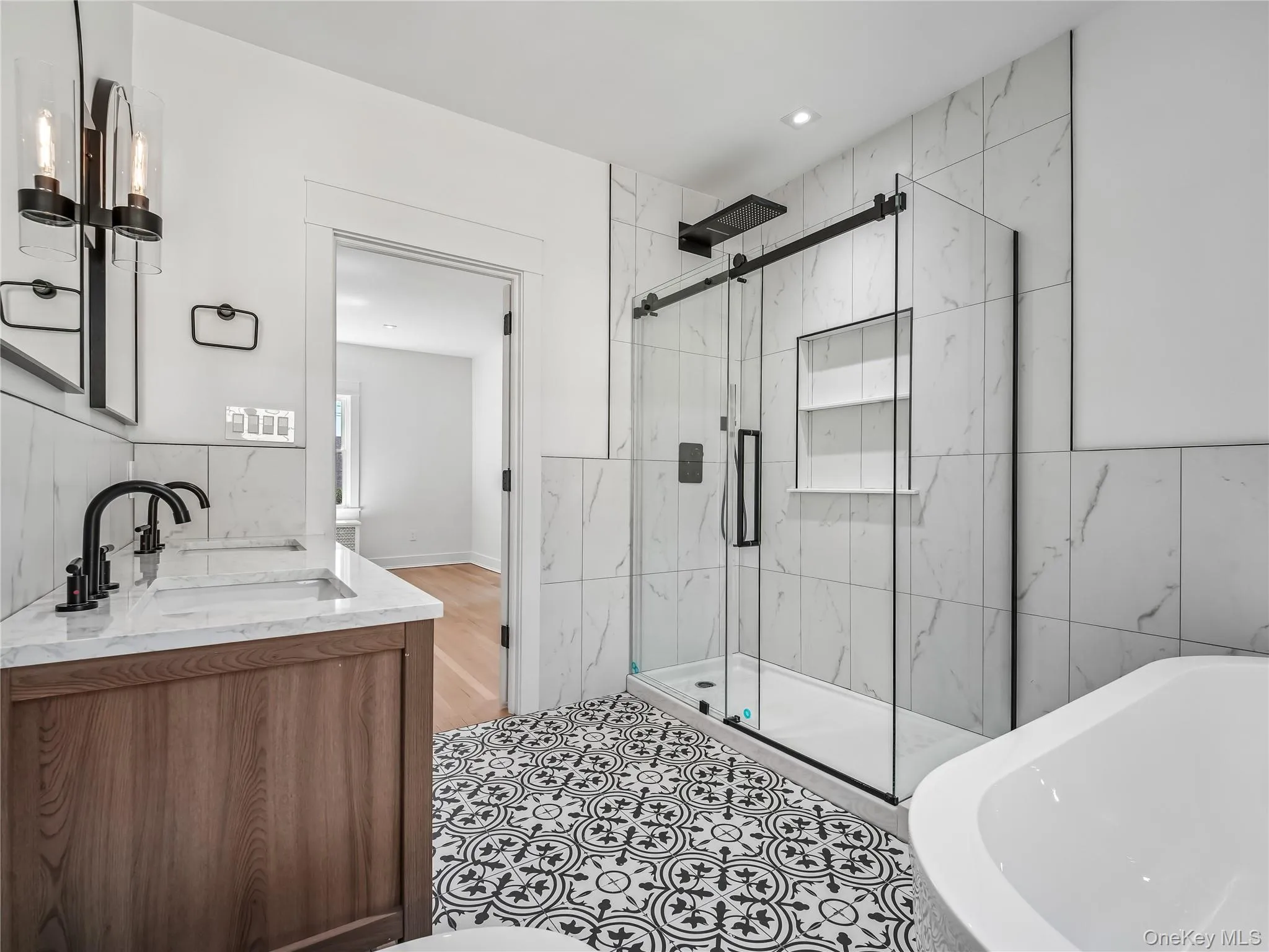 Brand new custom en-suite spa bathroom with double vanity, glass-enclosed shower, large soaking bathtub and bidet toilet; all new flooring, lighting, window, plumbing, electric, and insulation. Brand new custom en-suite spa bathroom with double vanity, glass-enclosed shower, large soaking bathtub and bidet toilet; all new flooring, lighting, window, plumbing, electric, and insulation.