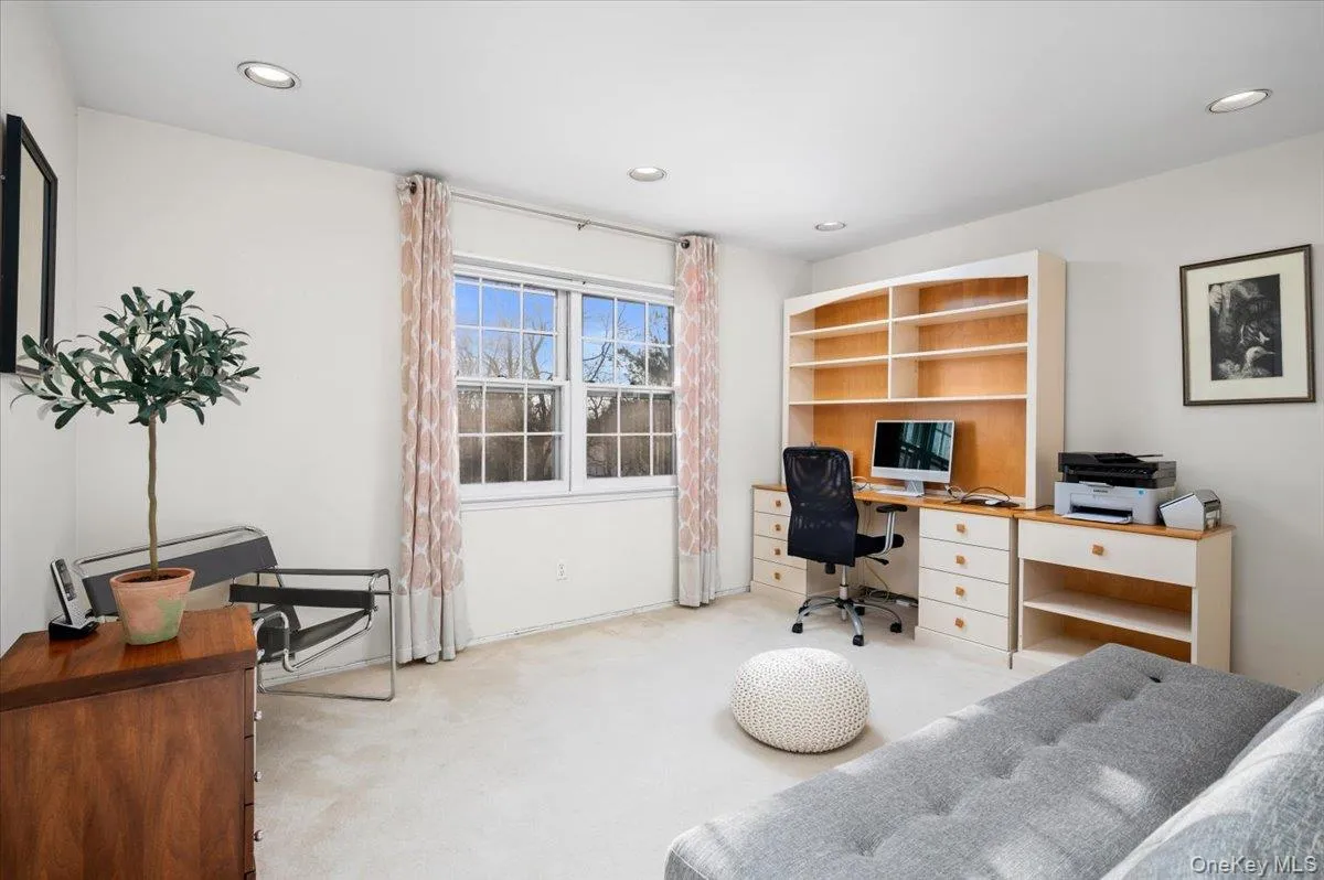 Bedroom #3 on second level currently utilized as an office. Bedroom #3 on second level currently utilized as an office.