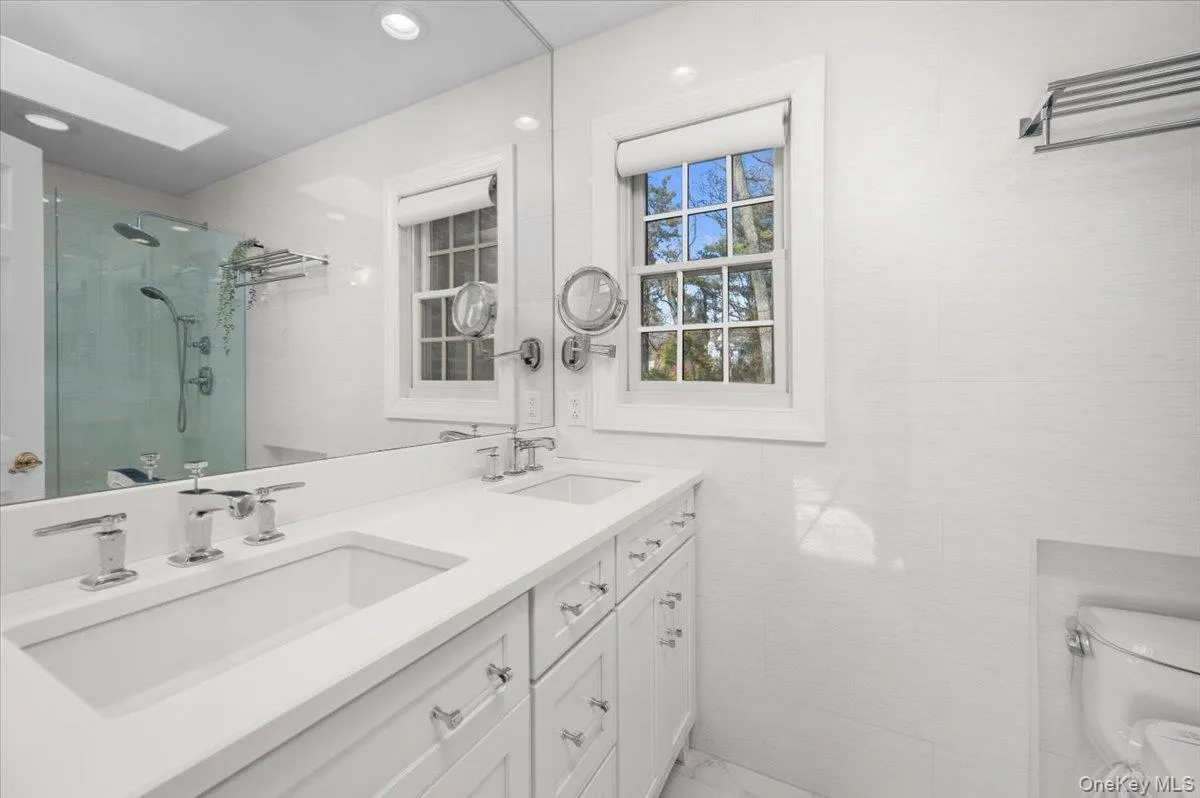 Renovated ensuite primary bathroom. Renovated ensuite primary bathroom.