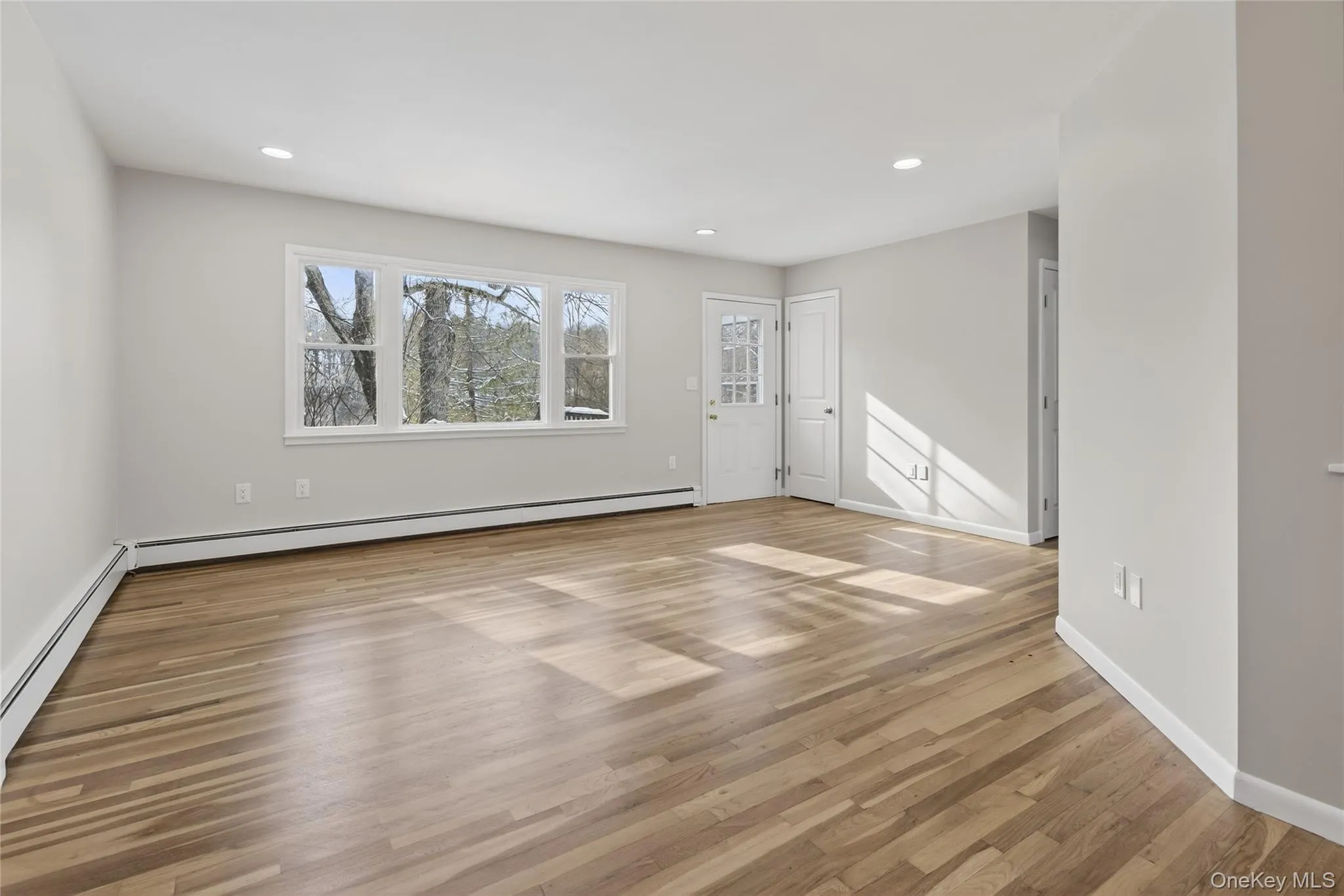 Spacious living room & dining room area Spacious living room & dining room area