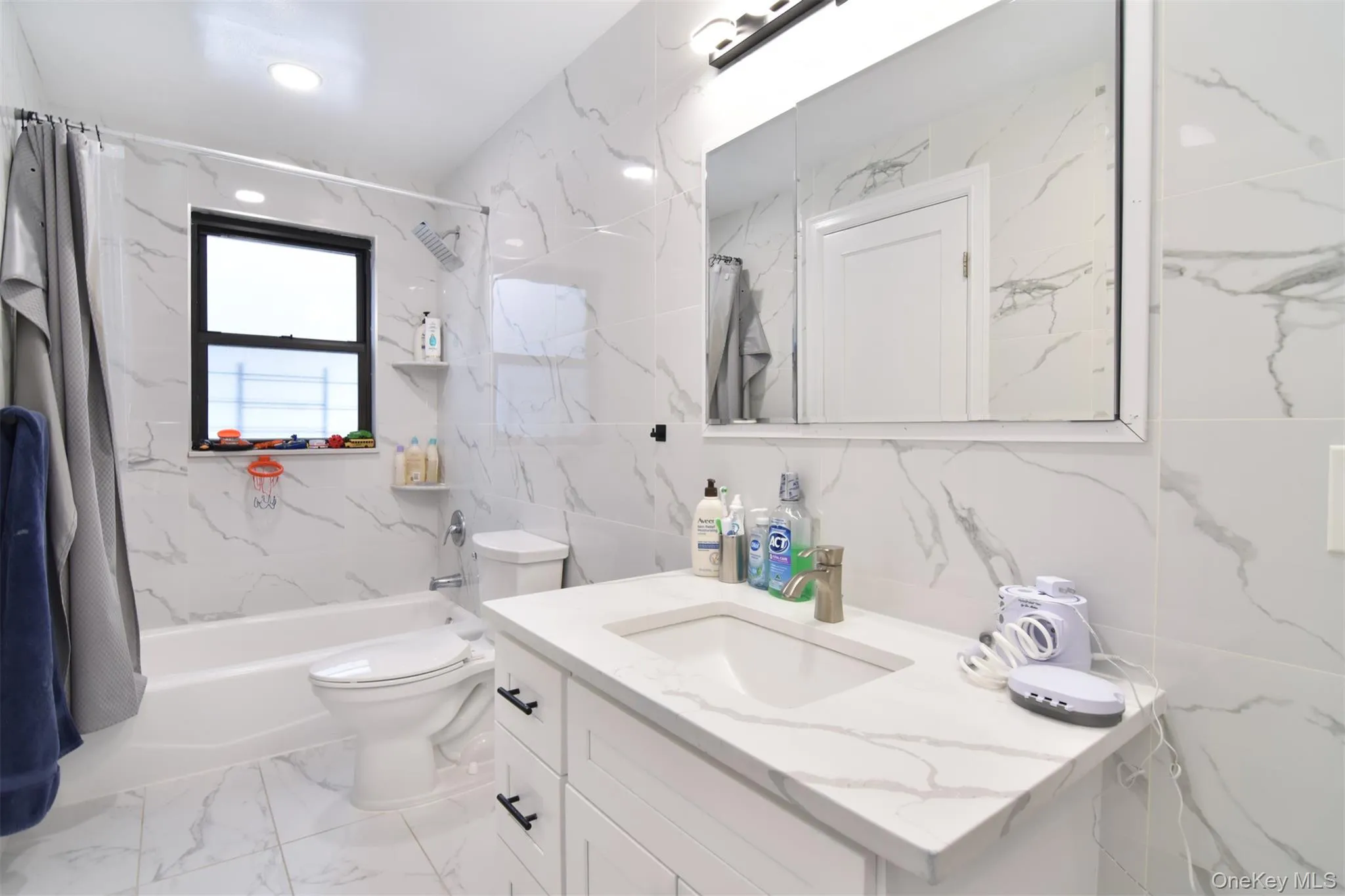 Fully renovated tile bathroom shower and tub, linen closet. Fully renovated tile bathroom shower and tub, linen closet.