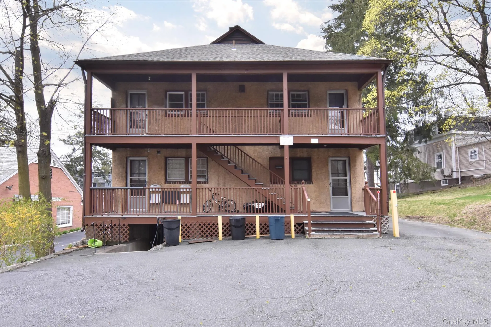Rear access to all apartments from the parking lot. Rear access to all apartments from the parking lot.