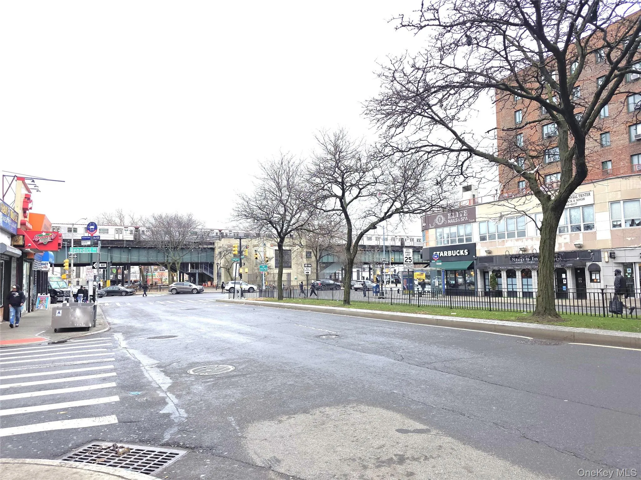 Street scene on Metropolitan Ave features numerous stores and shops. Street scene on Metropolitan Ave features numerous stores and shops.