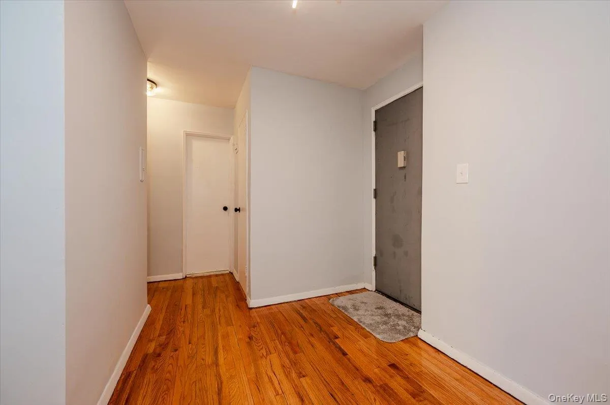 Foyer area features fresh paint, new light fixture and polished hardwood floors. Foyer area features fresh paint, new light fixture and polished hardwood floors.