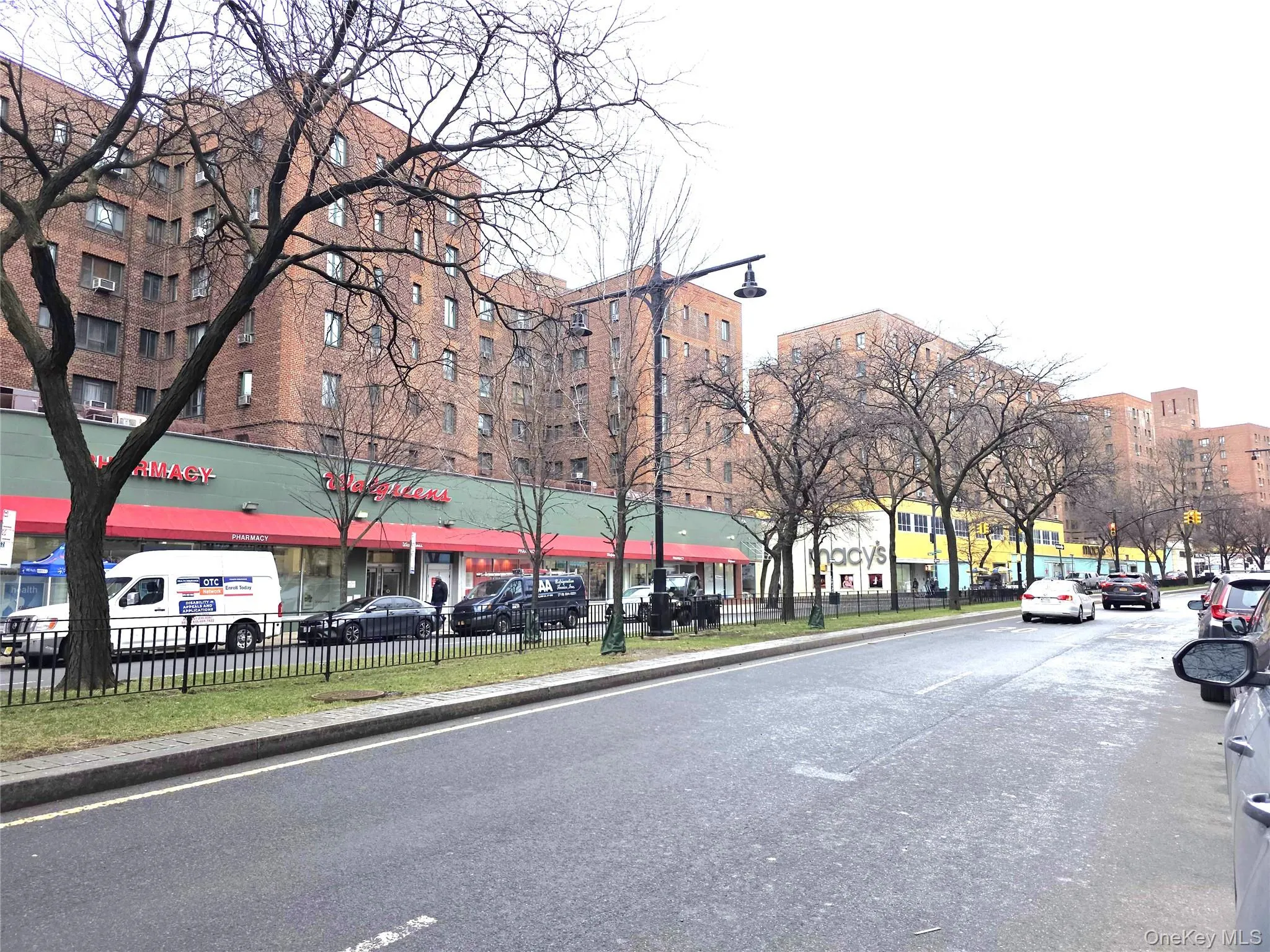 Street scene on Metropolitan Ave features numerous stores and shops. Street scene on Metropolitan Ave features numerous stores and shops.