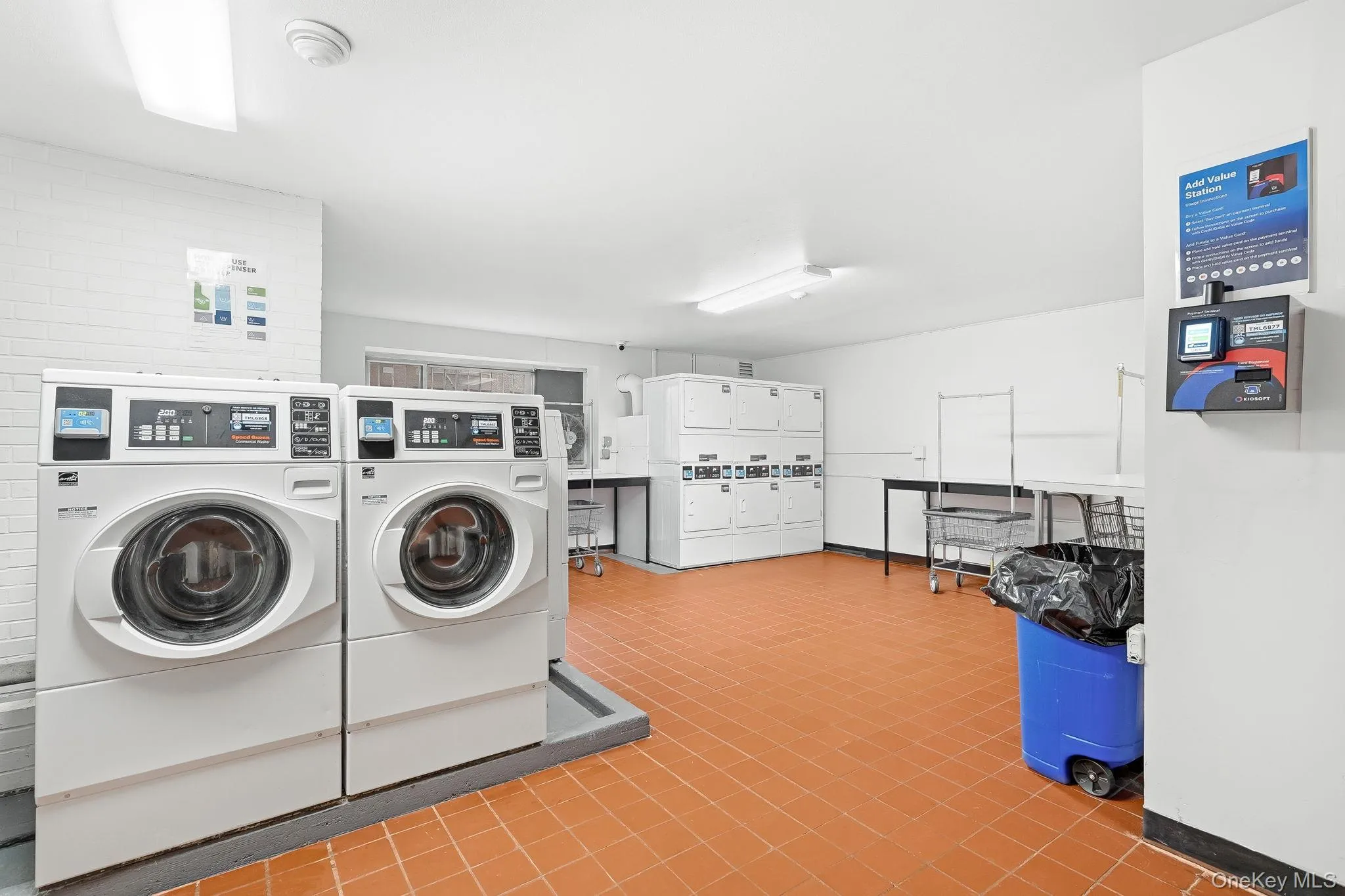The common laundry room on the main level of the building. The common laundry room on the main level of the building.