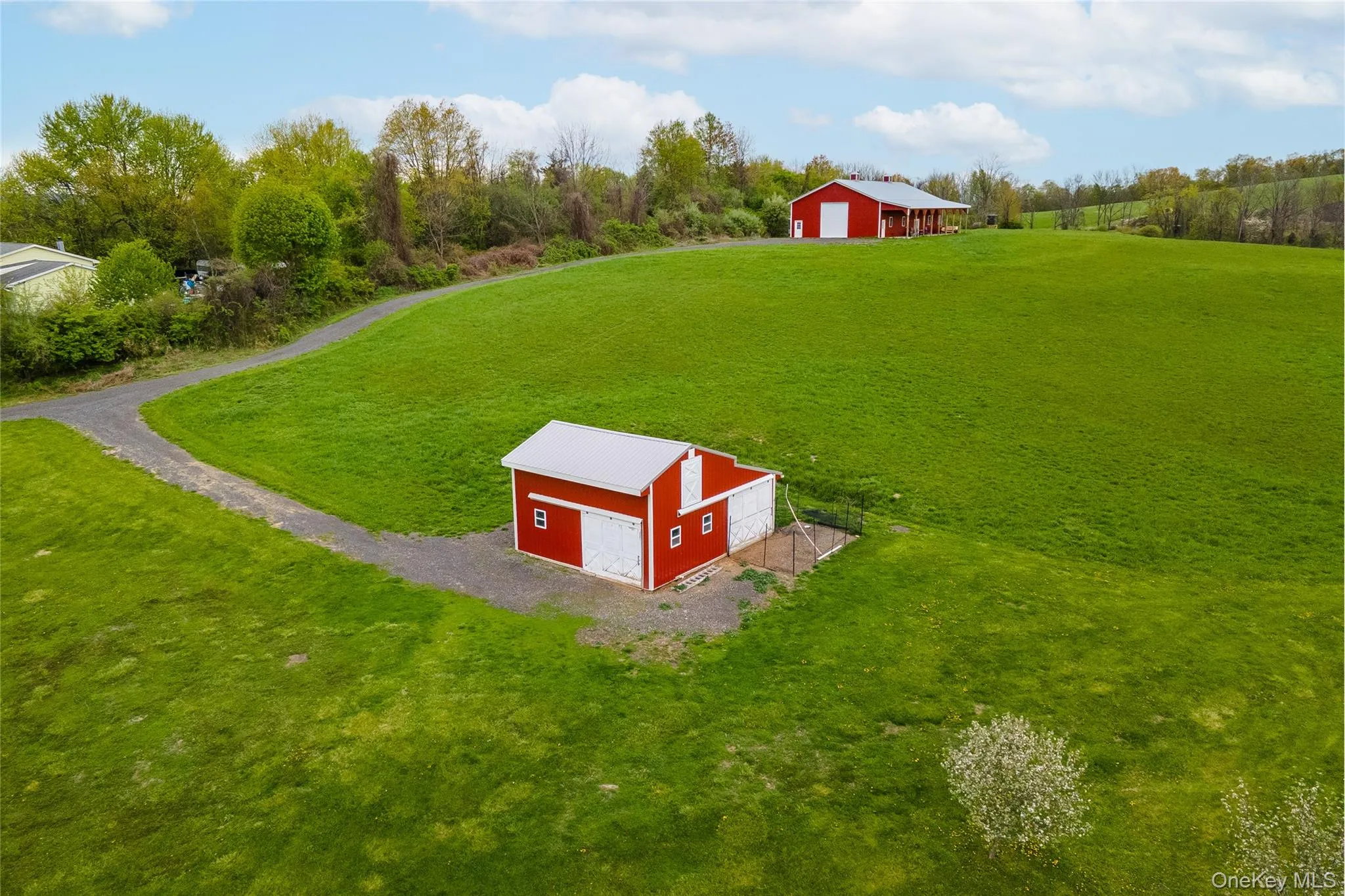 Red barn currently houses chickens, but was once a 4 stall horse barn Red barn currently houses chickens, but was once a 4 stall horse barn