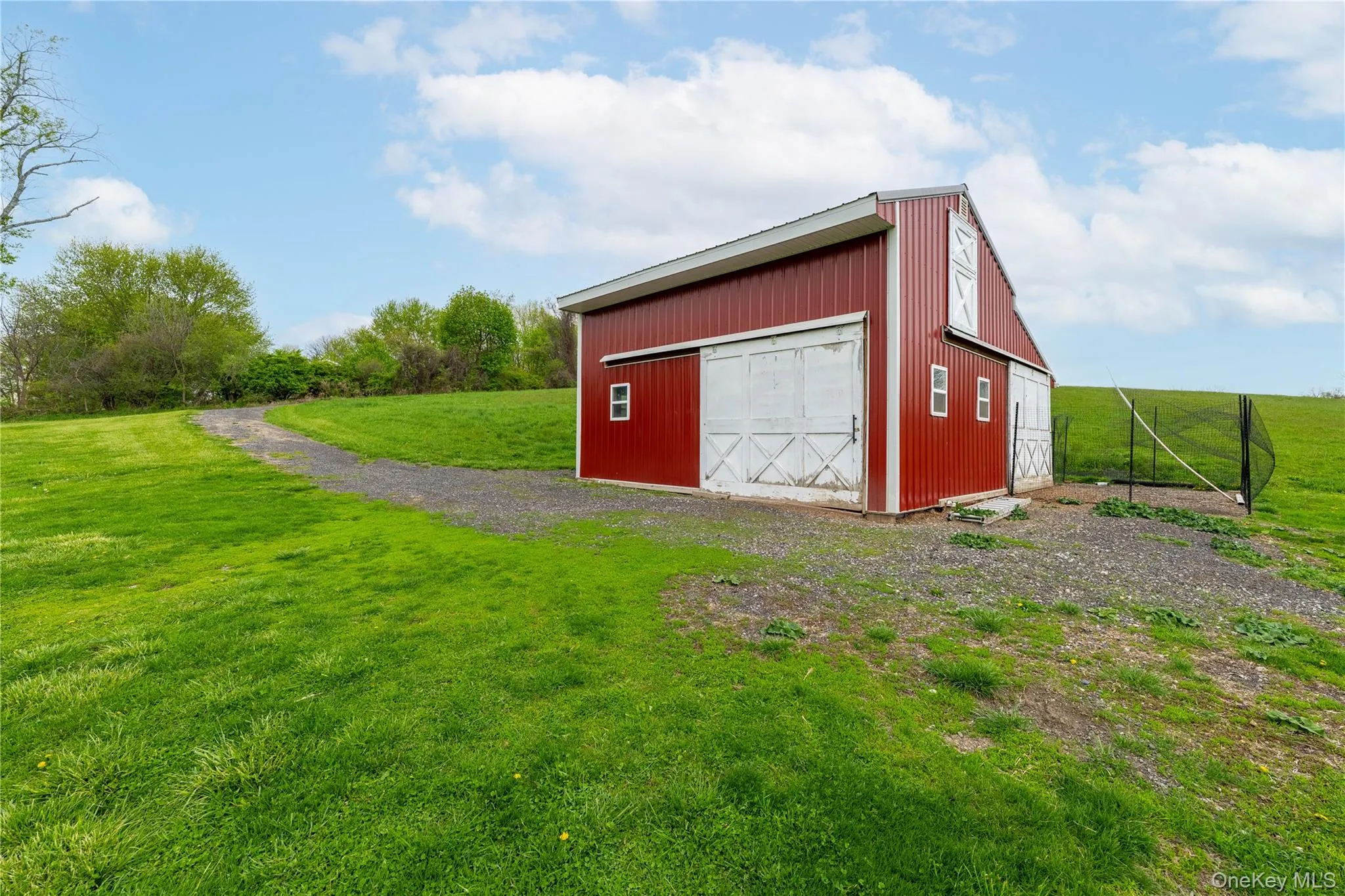725 sq ft Red barn currently houses chickens, but could be a horse barn too 725 sq ft Red barn currently houses chickens, but could be a horse barn too