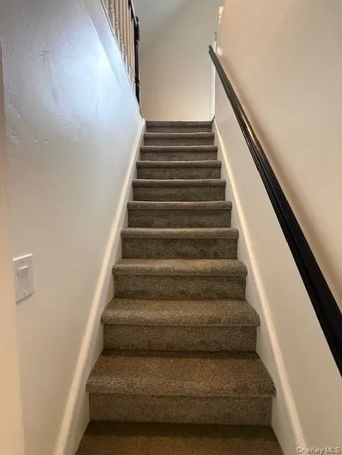 Stairs leading to 3rd floor Stairs leading to 3rd floor