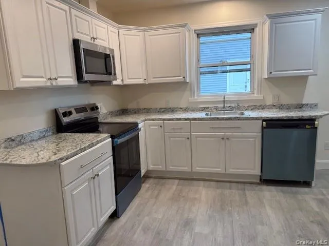 Completely renovated eat in kitchen with stainless steel appliances Completely renovated eat in kitchen with stainless steel appliances
