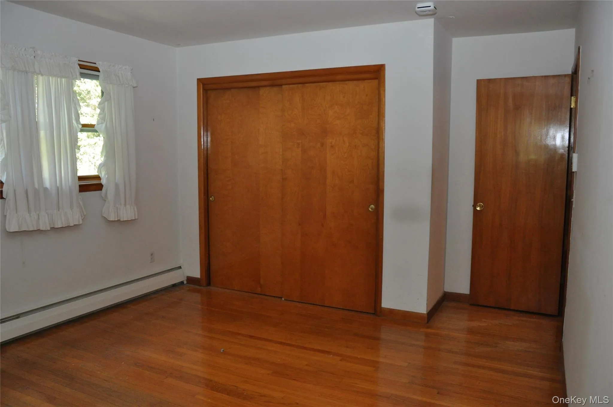 Primary Bedroom Closet Primary Bedroom Closet