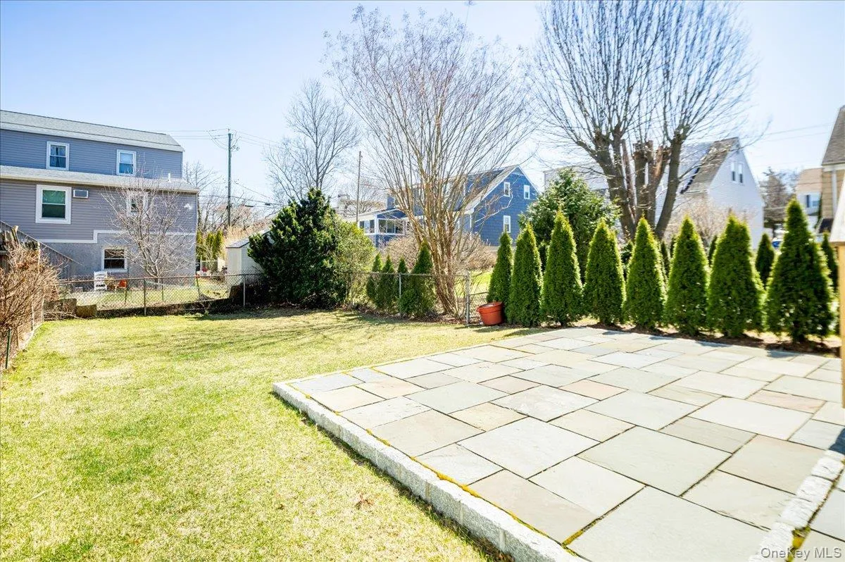 View of yard with a patio and fence View of yard with a patio and fence