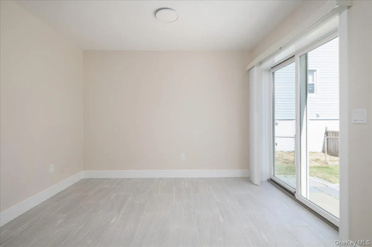 Empty room featuring baseboards Empty room featuring baseboards