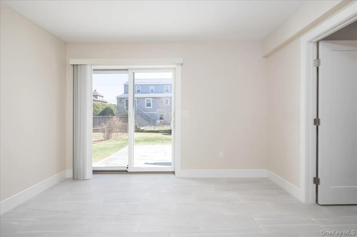 Spare room featuring baseboards Spare room featuring baseboards