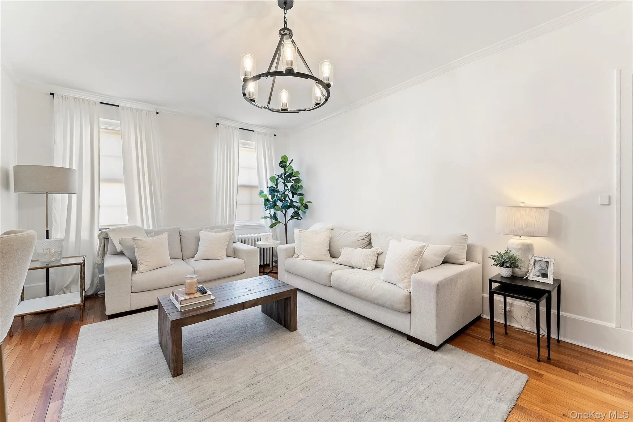 Kitchen opens into large living room with hardwood floors, high ceilings and access to the peninsula. Kitchen opens into large living room with hardwood floors, high ceilings and access to the peninsula.