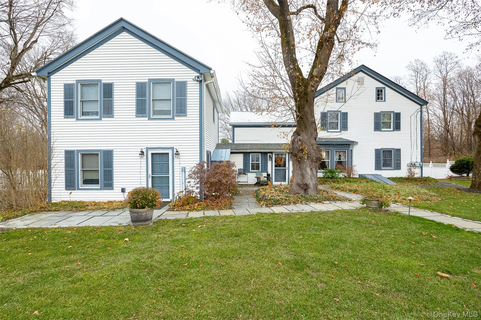 Traditional home featuring a front yard Traditional home featuring a front yard